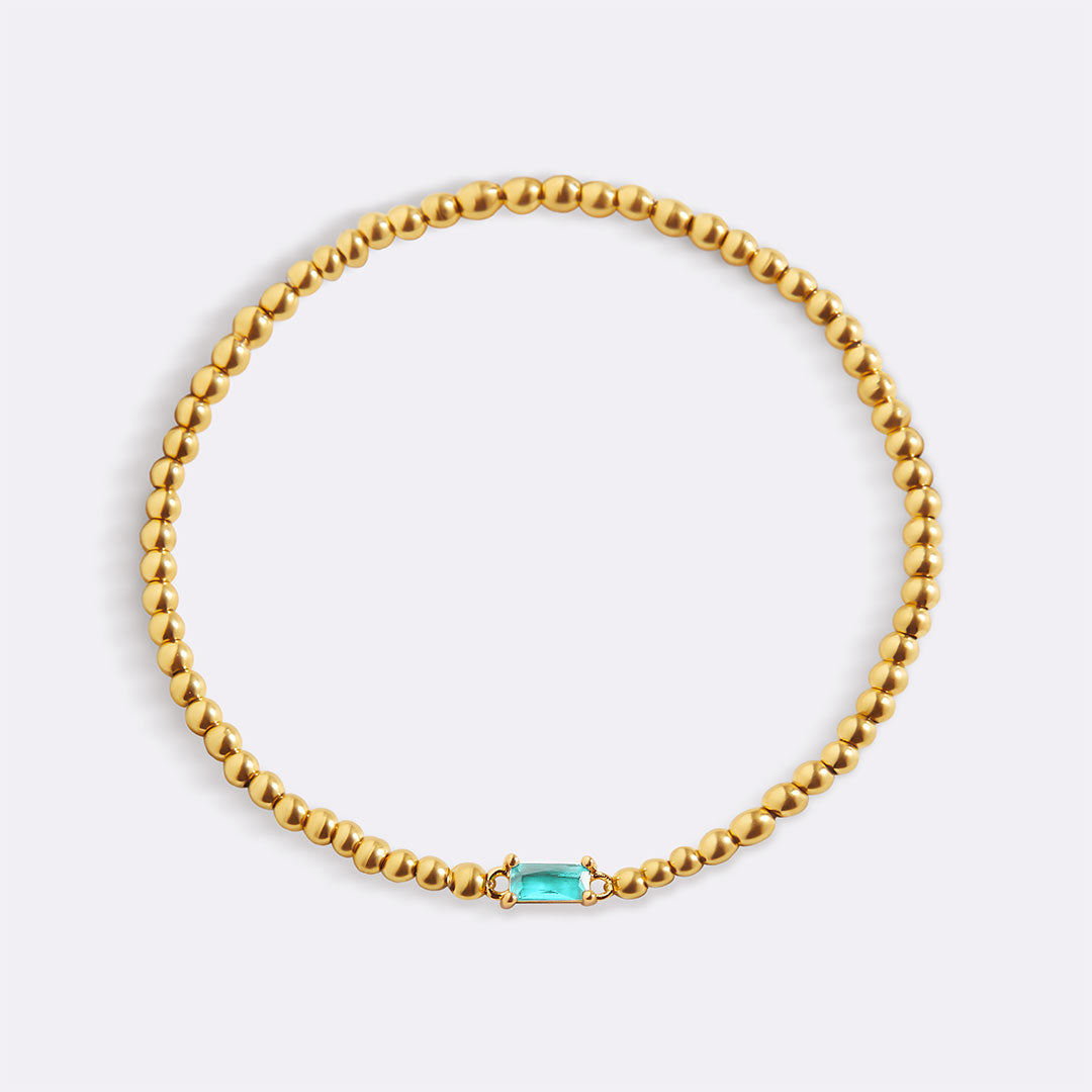 Gold Beaded Birthstone Bracelet in gold tone with March birthstone