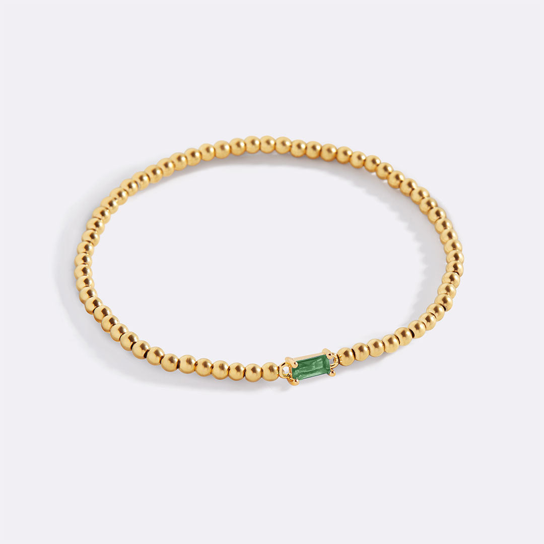 Gold Beaded Birthstone Bracelet in gold tone with May birthstone