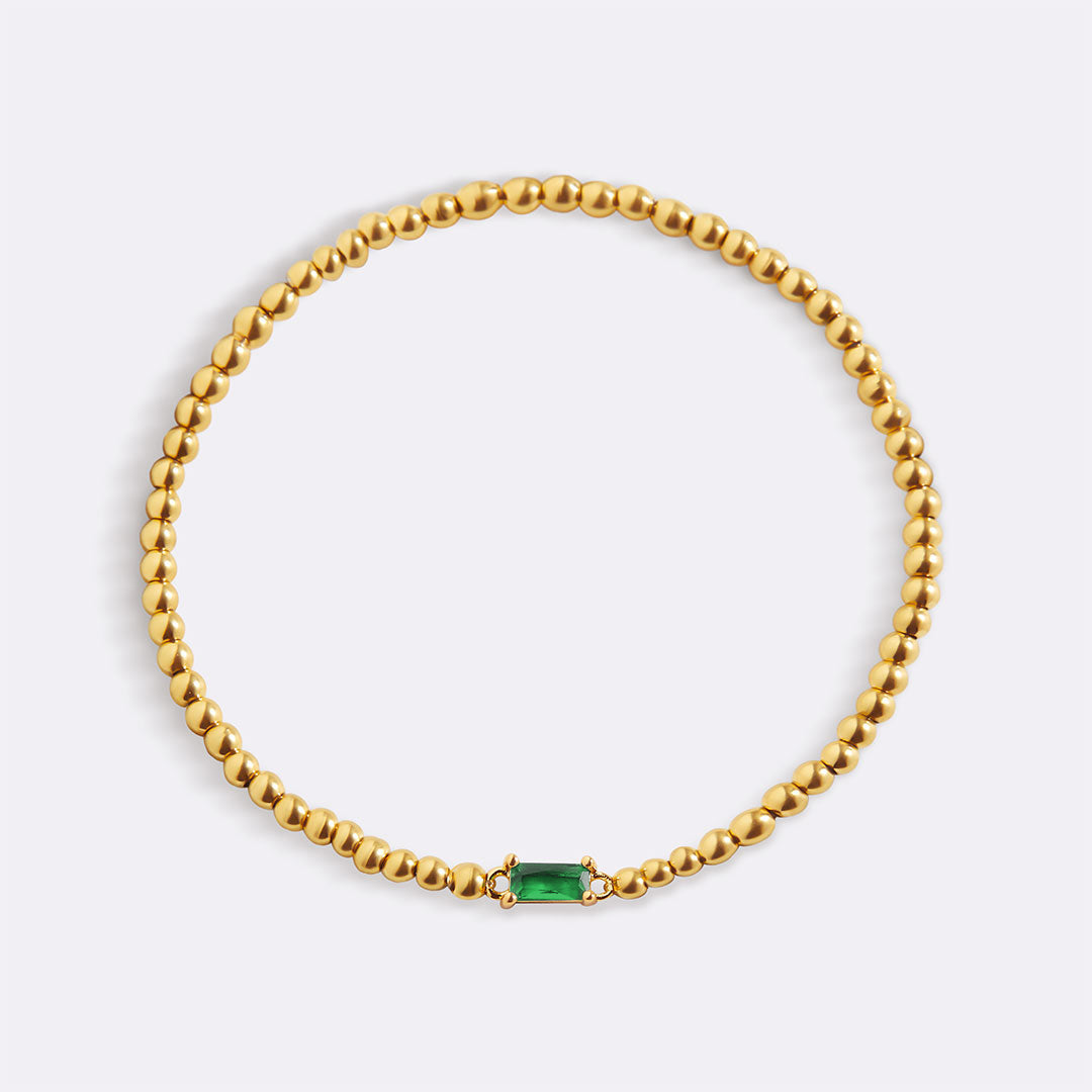 Gold Beaded Birthstone Bracelet in gold tone with May birthstone