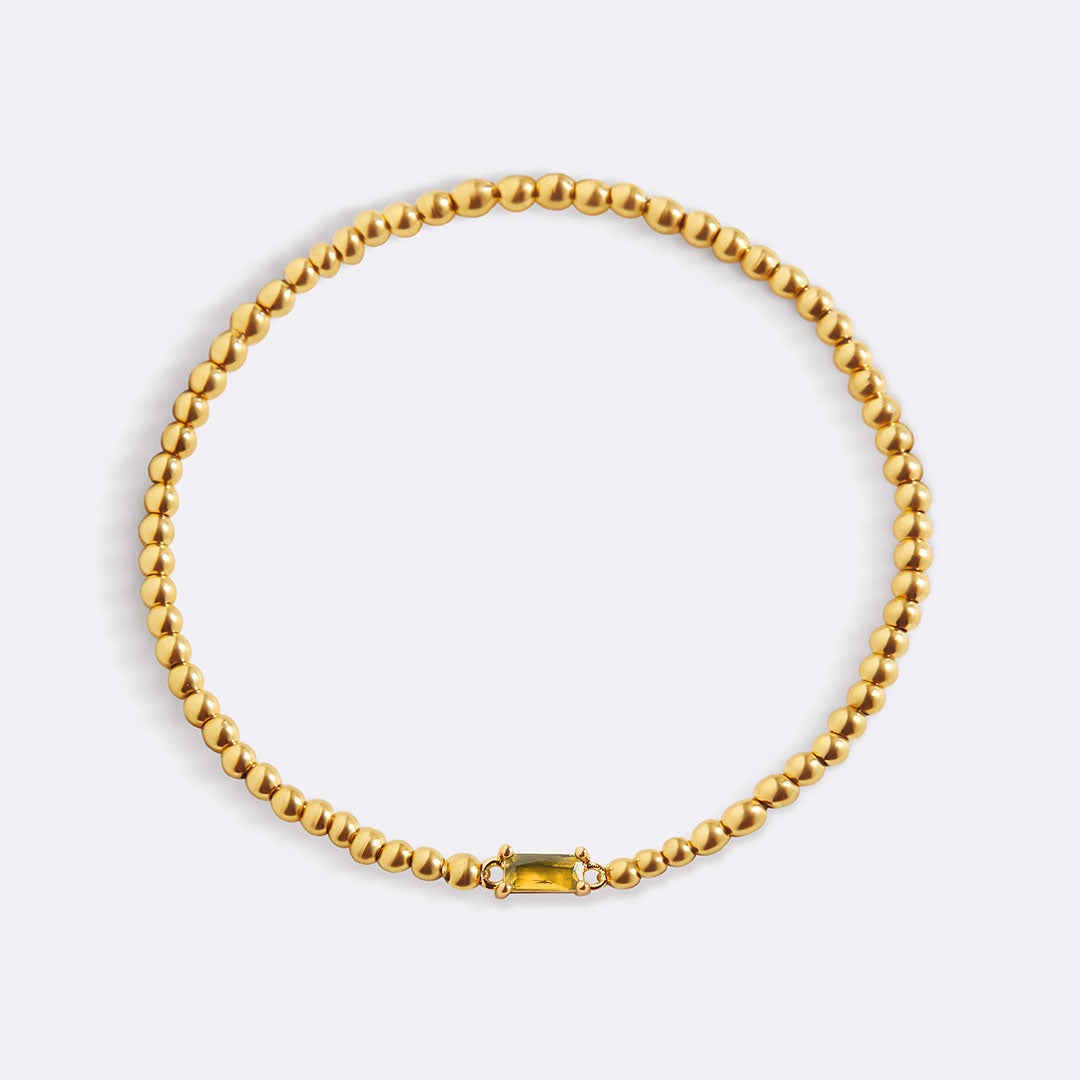 Gold Beaded Birthstone Bracelet in gold tone with November birthstone