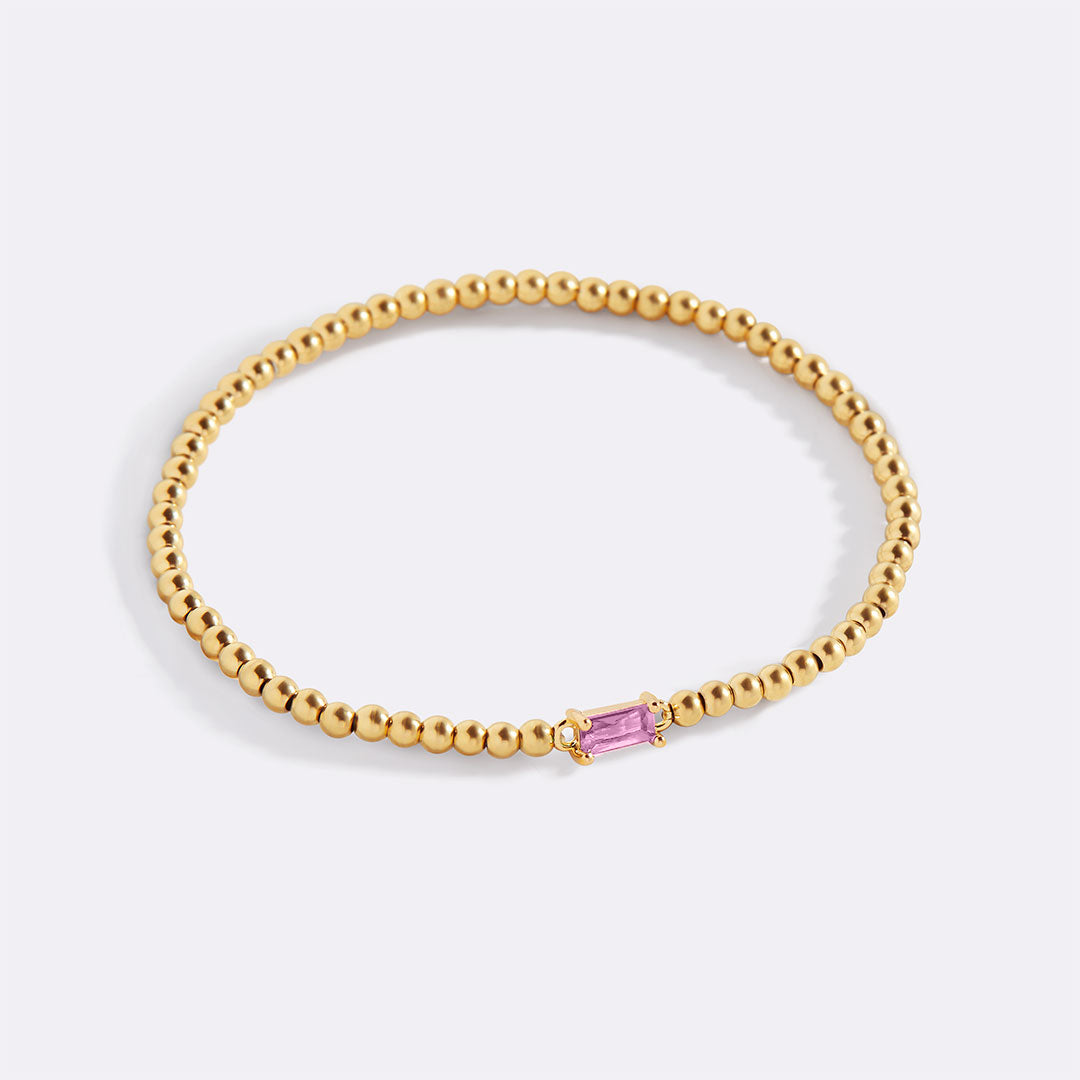 Gold Beaded Birthstone Bracelet in gold tone with October birthstone