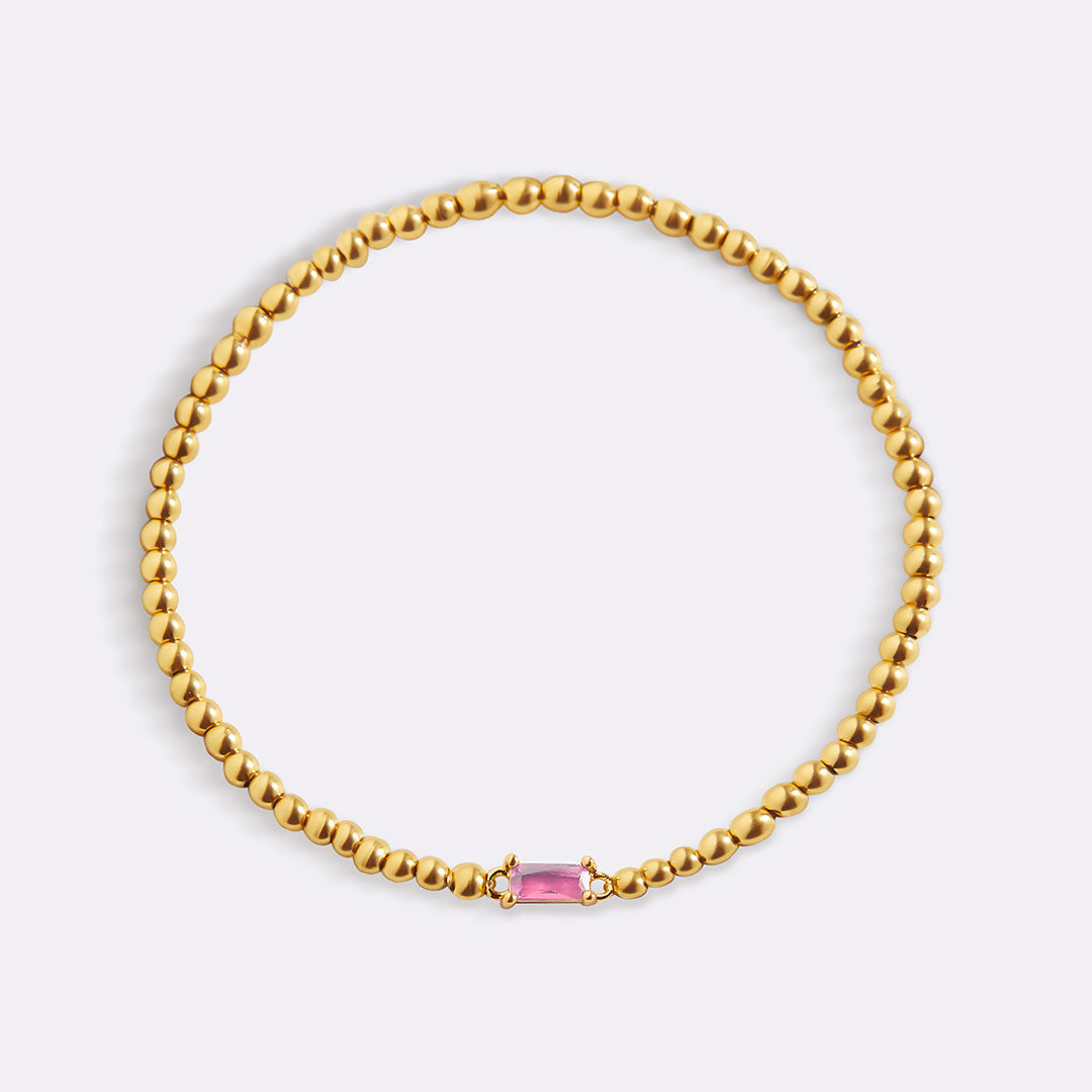 Gold Beaded Birthstone Bracelet in gold tone with October birthstone