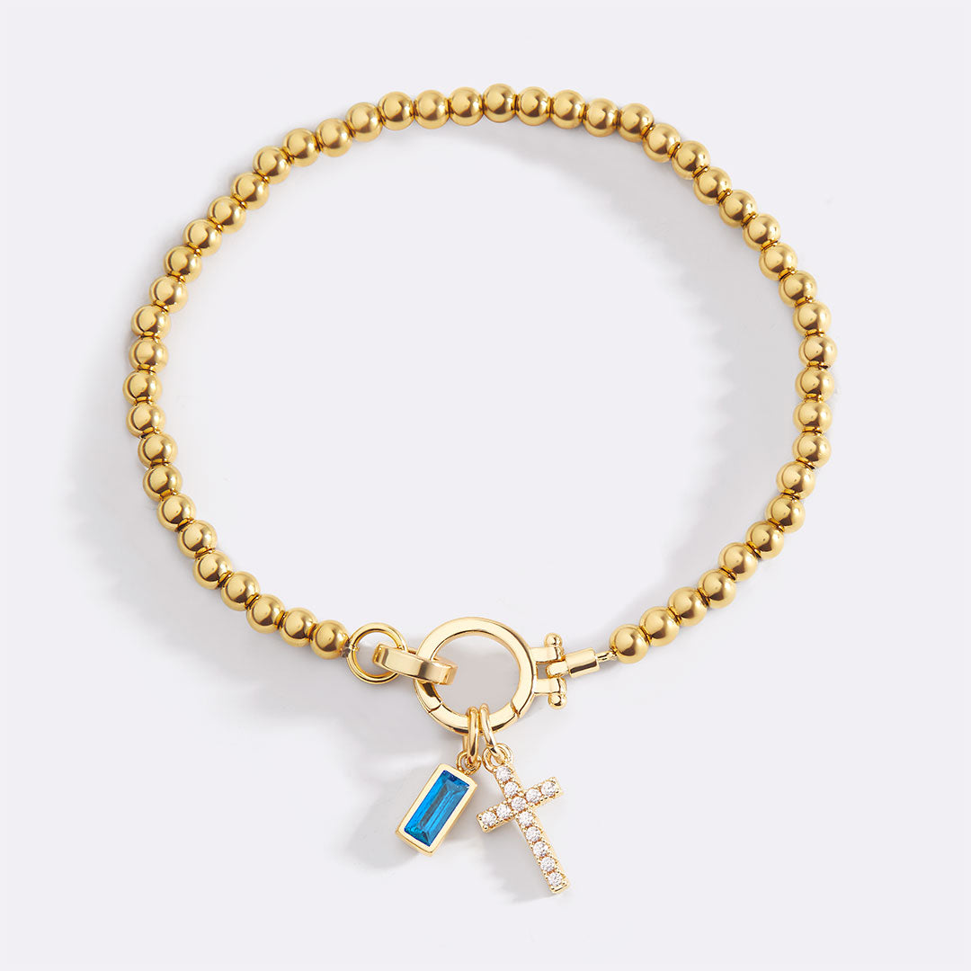 Cross Charm Birthstone Bracelet with December birthstone