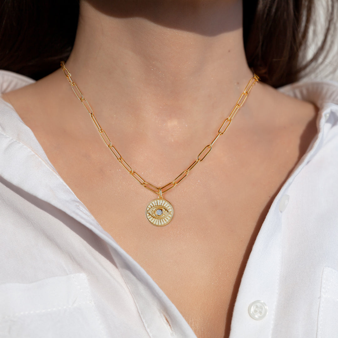 Evil Eye Coin Pendant Necklace with Paperclip Chain, worn on a model