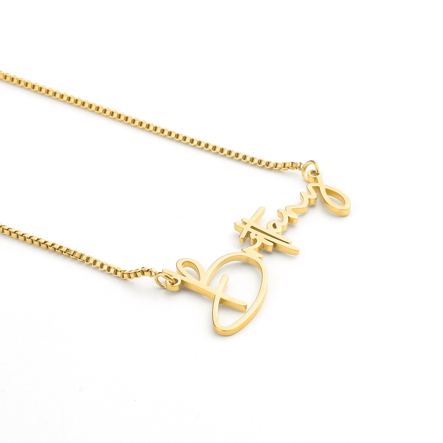 Modern Name Necklace in gold tone, flat lay detail