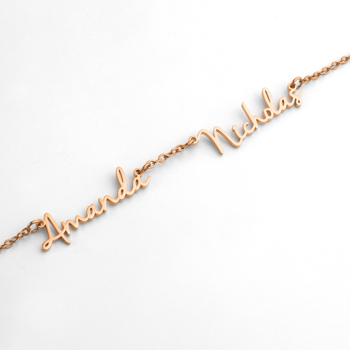 Fairy Multiple Name Necklace | Add Up to 4 Names in rose gold tone, flat lay detail