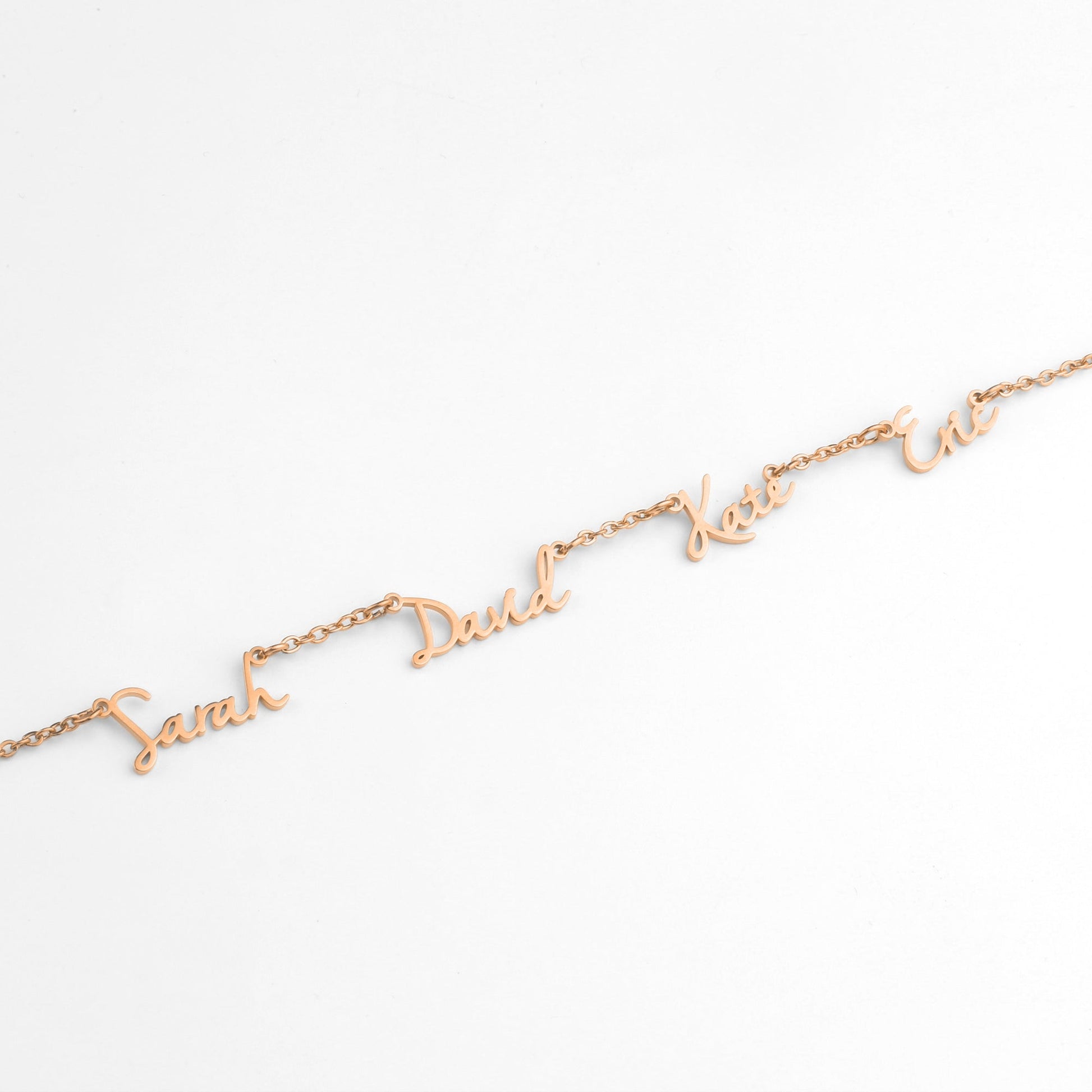 Fairy Multiple Name Necklace | Add Up to 4 Names in rose gold tone, flat lay detail
