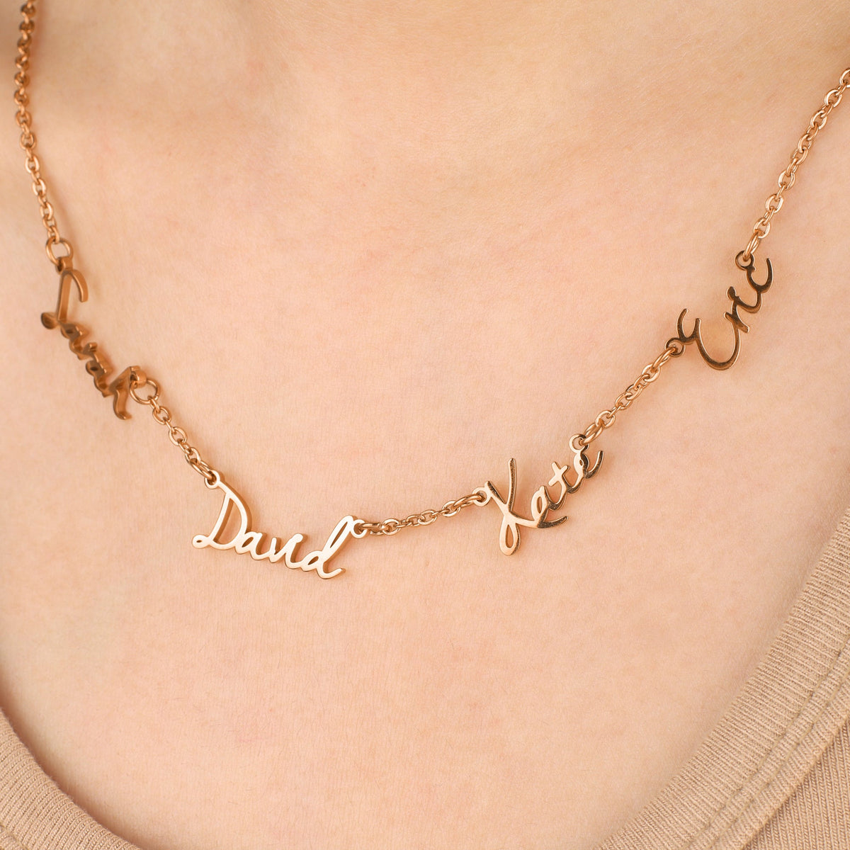 Fairy Multiple Name Necklace | Add Up to 4 Names in rose gold tone, worn on a model