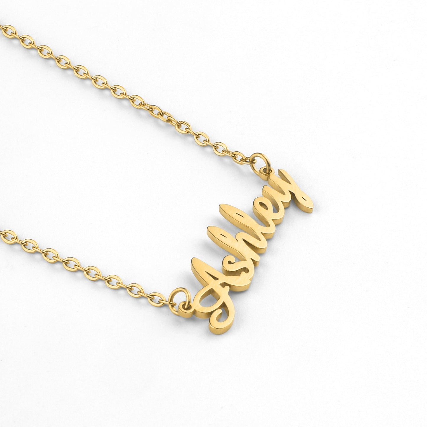 Quill Name Necklace in gold tone, flat lay detail