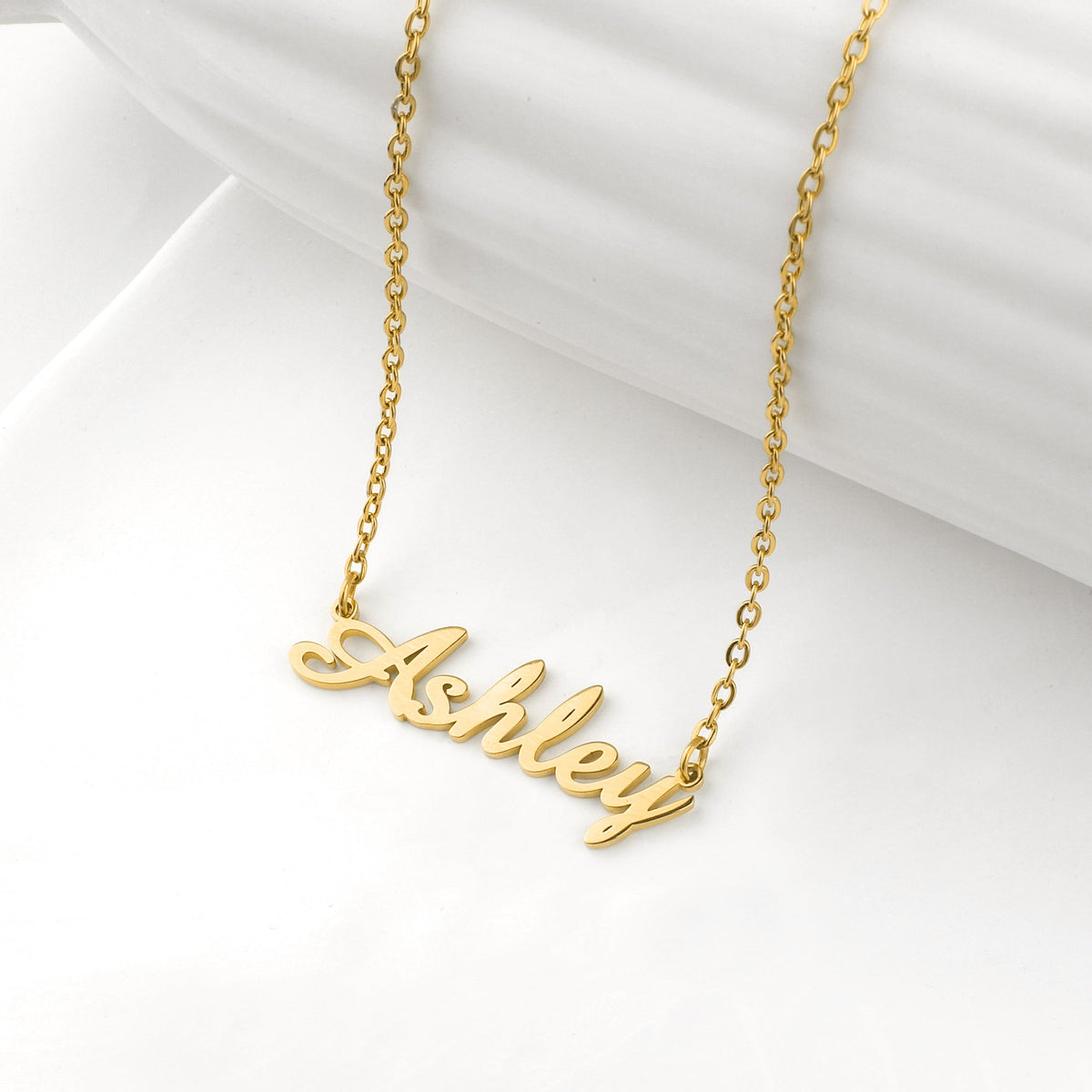 Quill Name Necklace in gold tone, flat lay detail