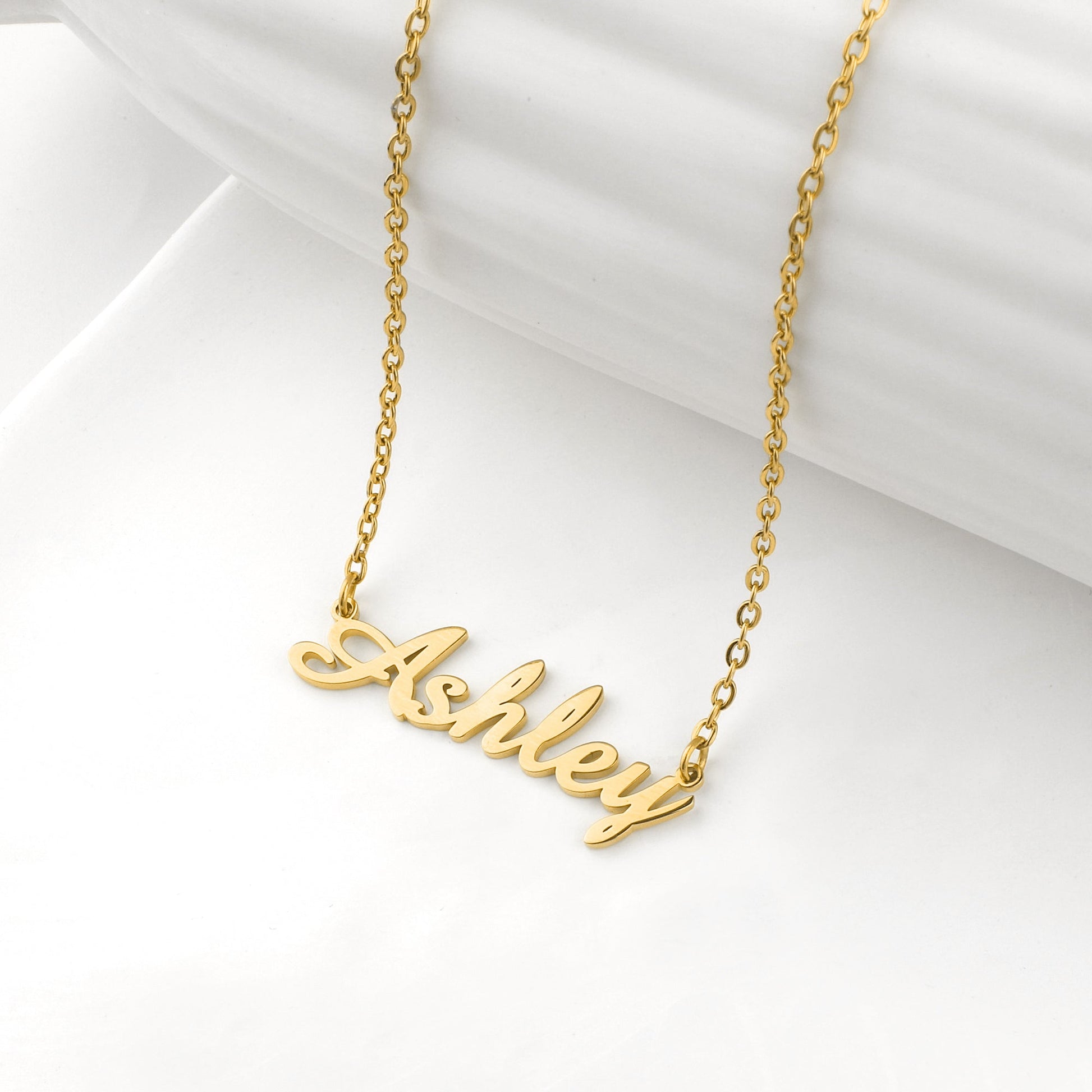 Quill Name Necklace in gold tone, flat lay detail