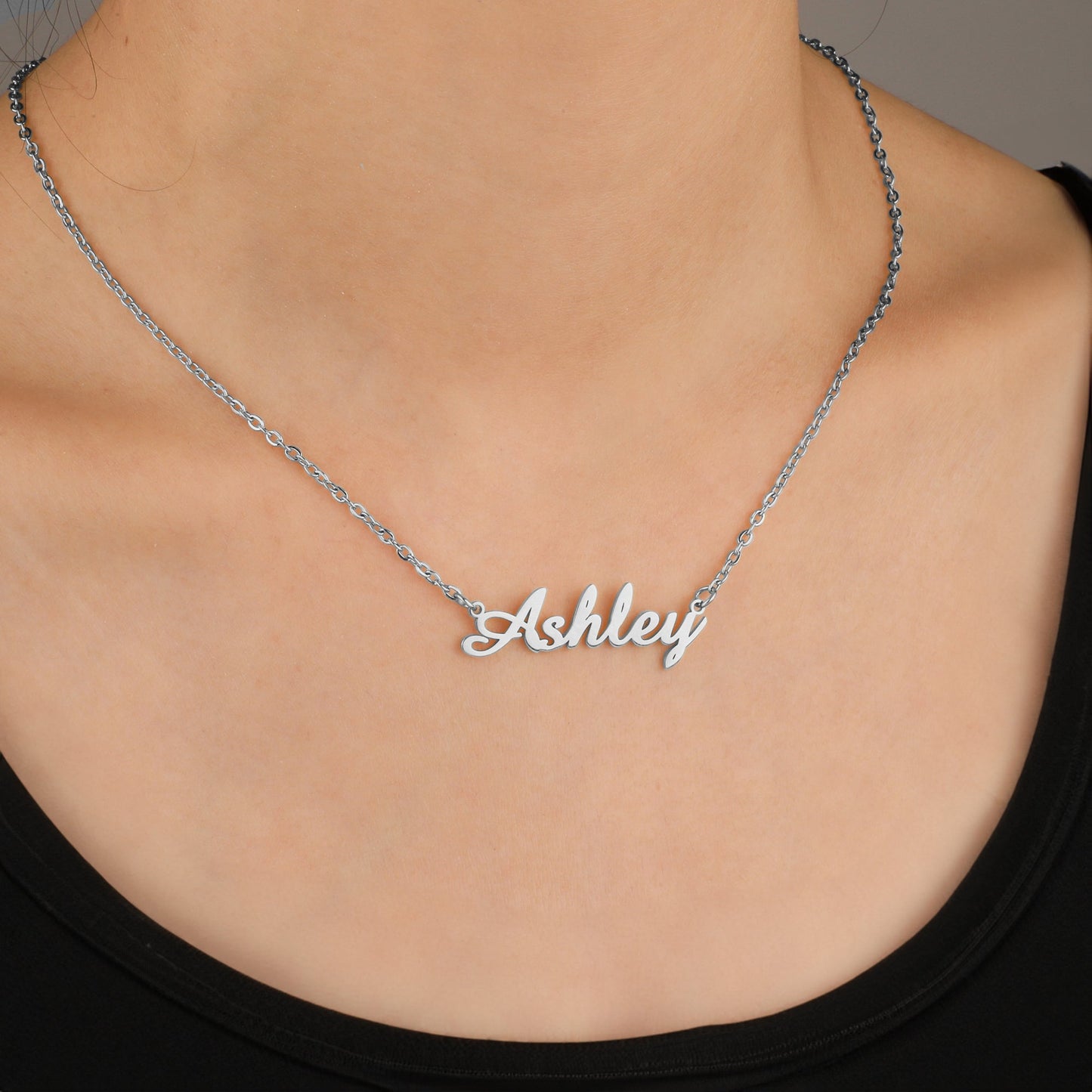 Quill Name Necklace in 925 sterling silver, worn on a model