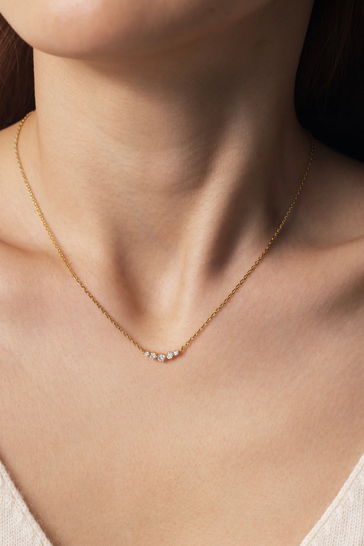 Mini Arc Diamond Necklace, worn on a model