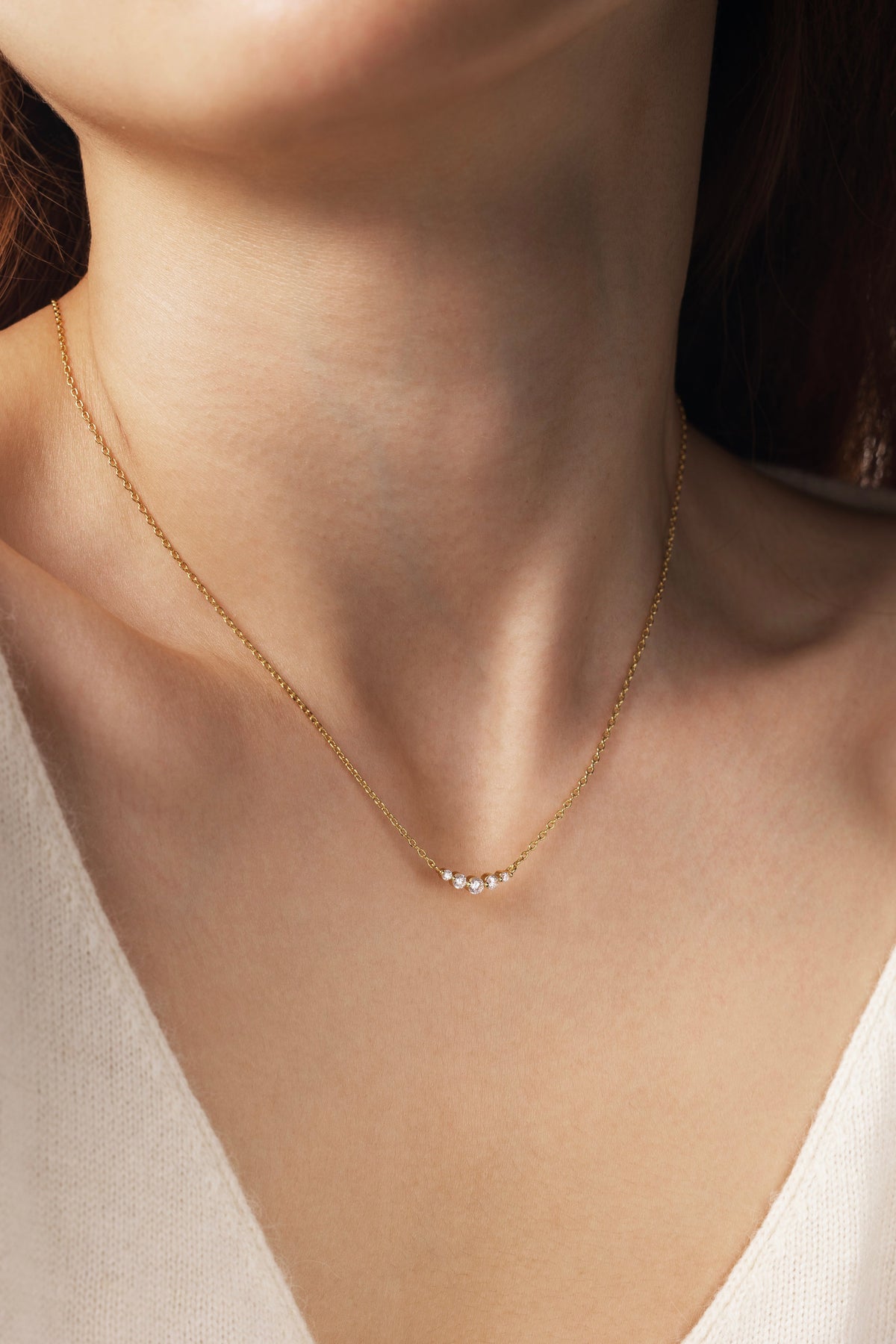Mini Arc Diamond Necklace, worn on a model