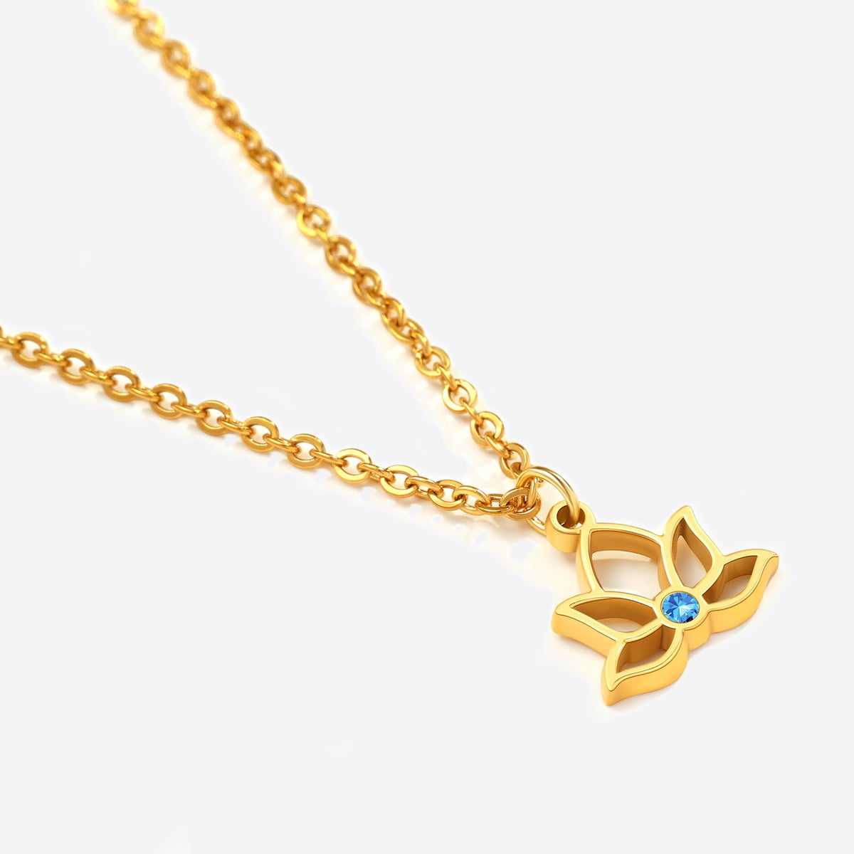 Mini Lotus Birthstone Pendant Necklace in gold tone with December birthstone