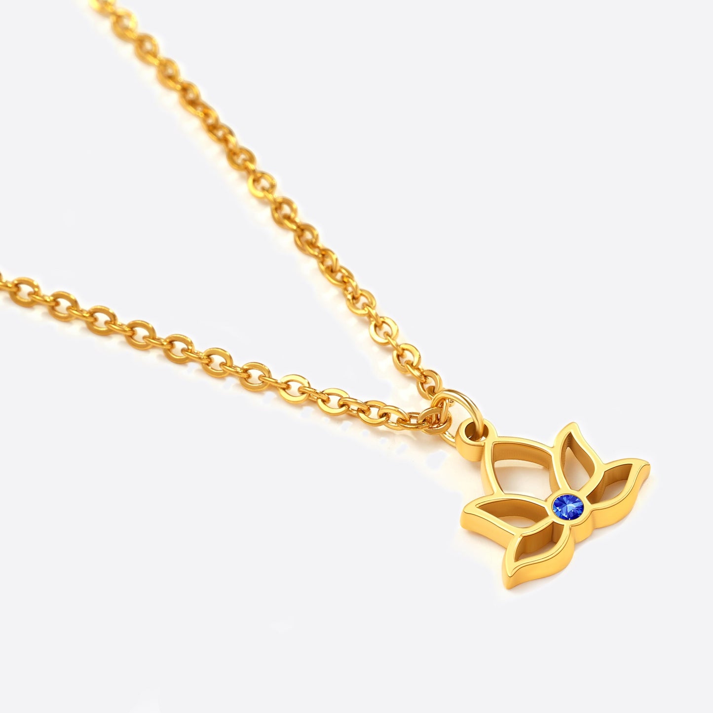 Mini Lotus Birthstone Pendant Necklace in gold tone with September birthstone