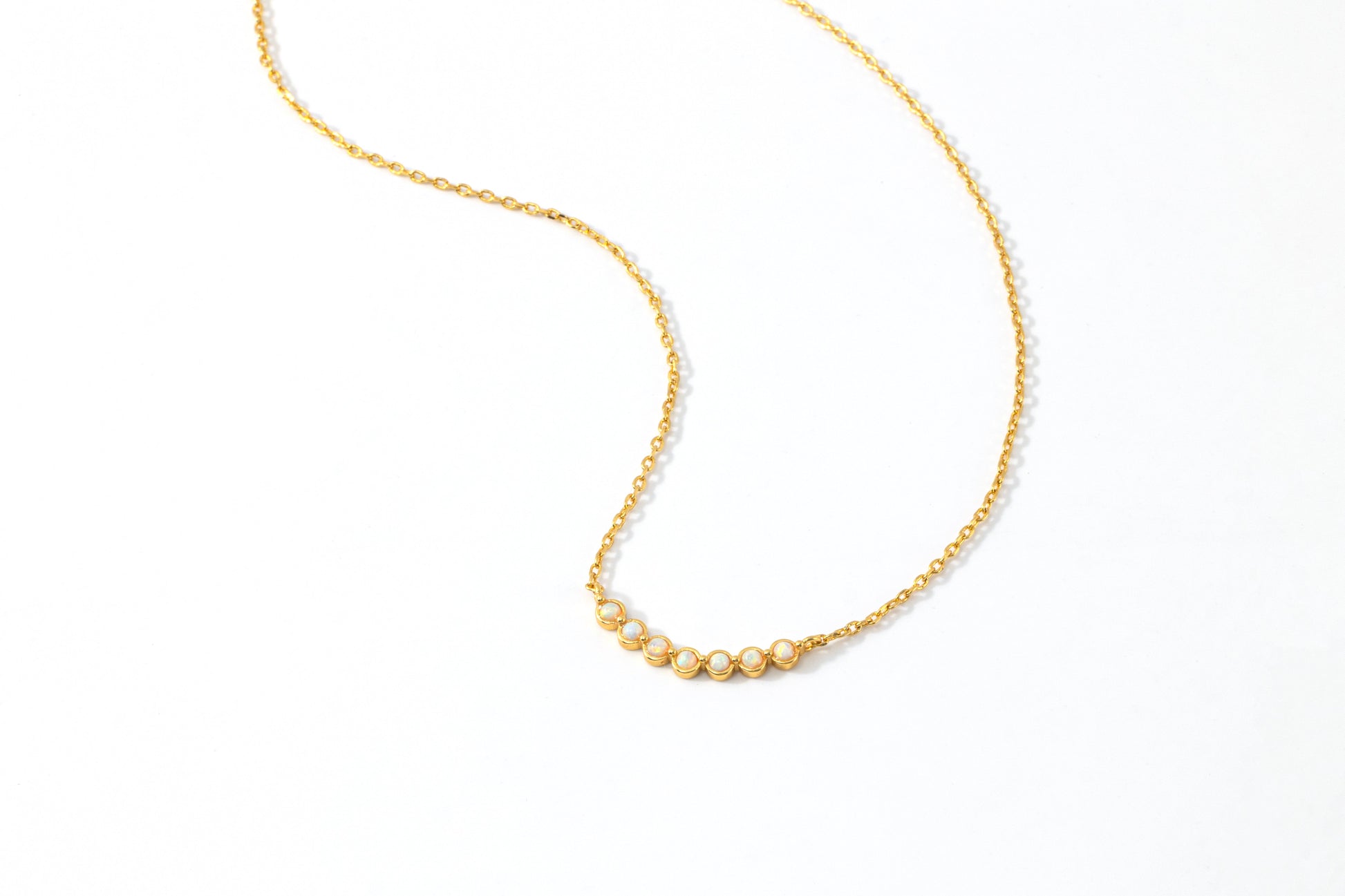 Opal Arc Necklace, flat lay detail