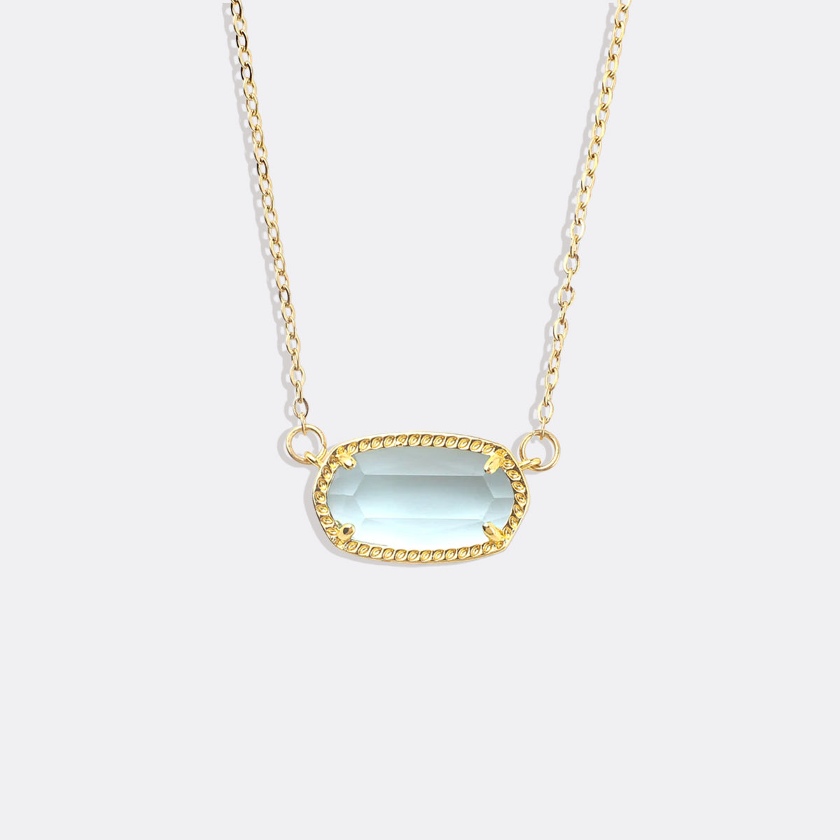 Oval Birthstone Pendant Necklace in gold tone with December birthstone
