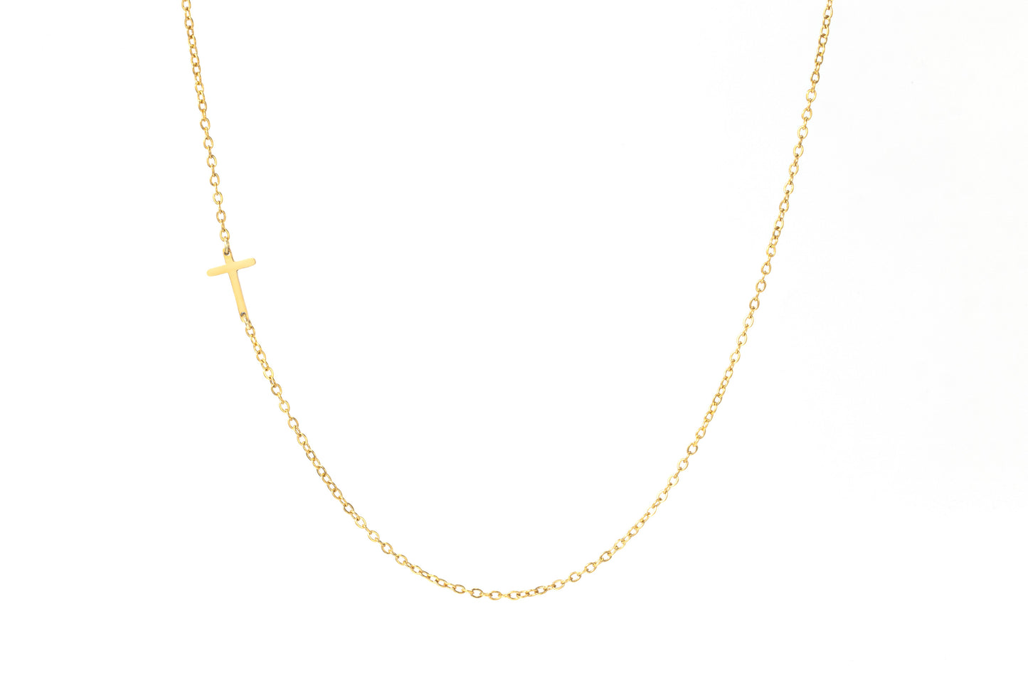 Dainty Sideways Cross Necklace in gold tone