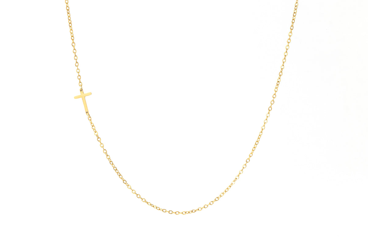 Dainty Sideways Cross Necklace in gold tone