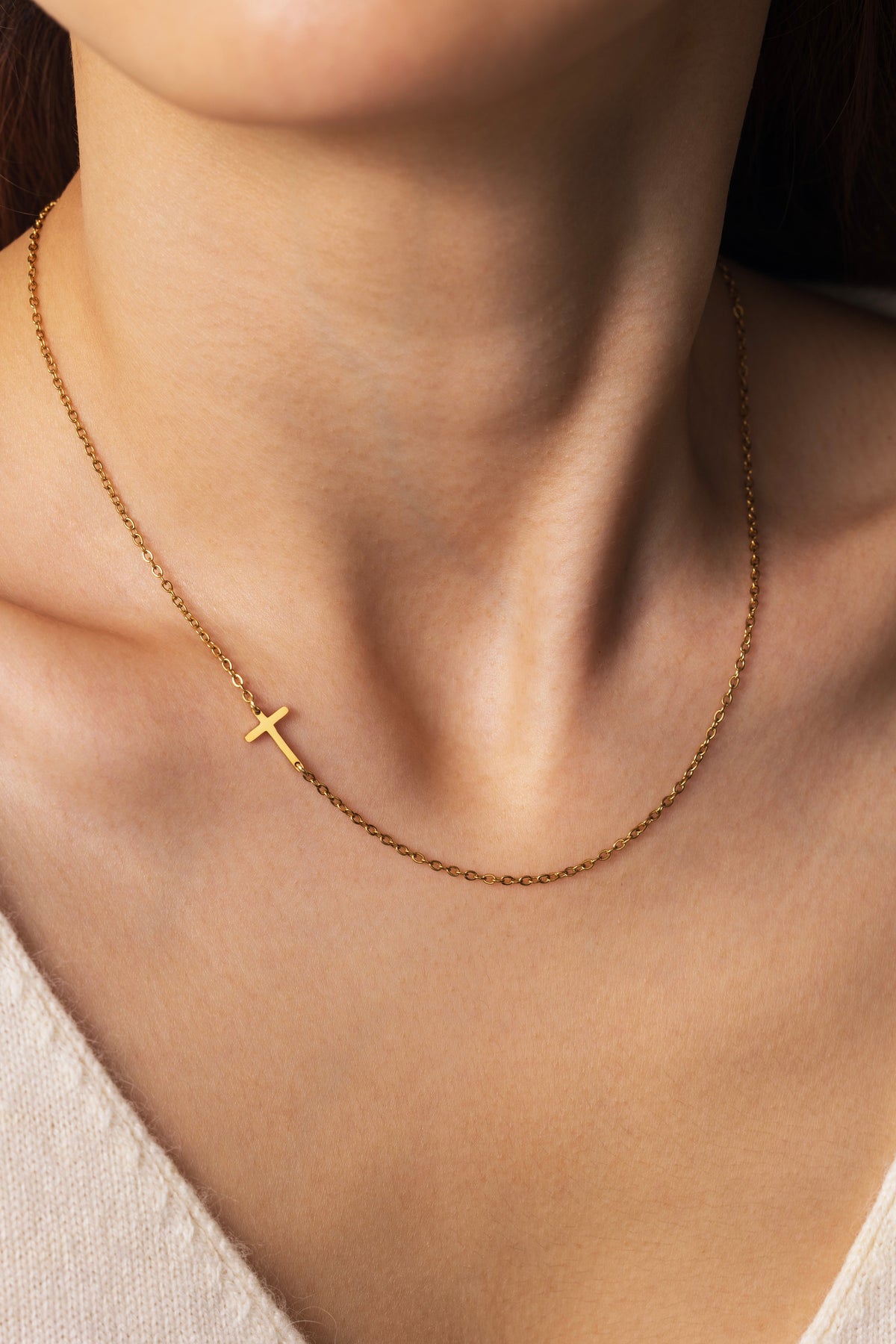 Dainty Sideways Cross Necklace, worn on a model