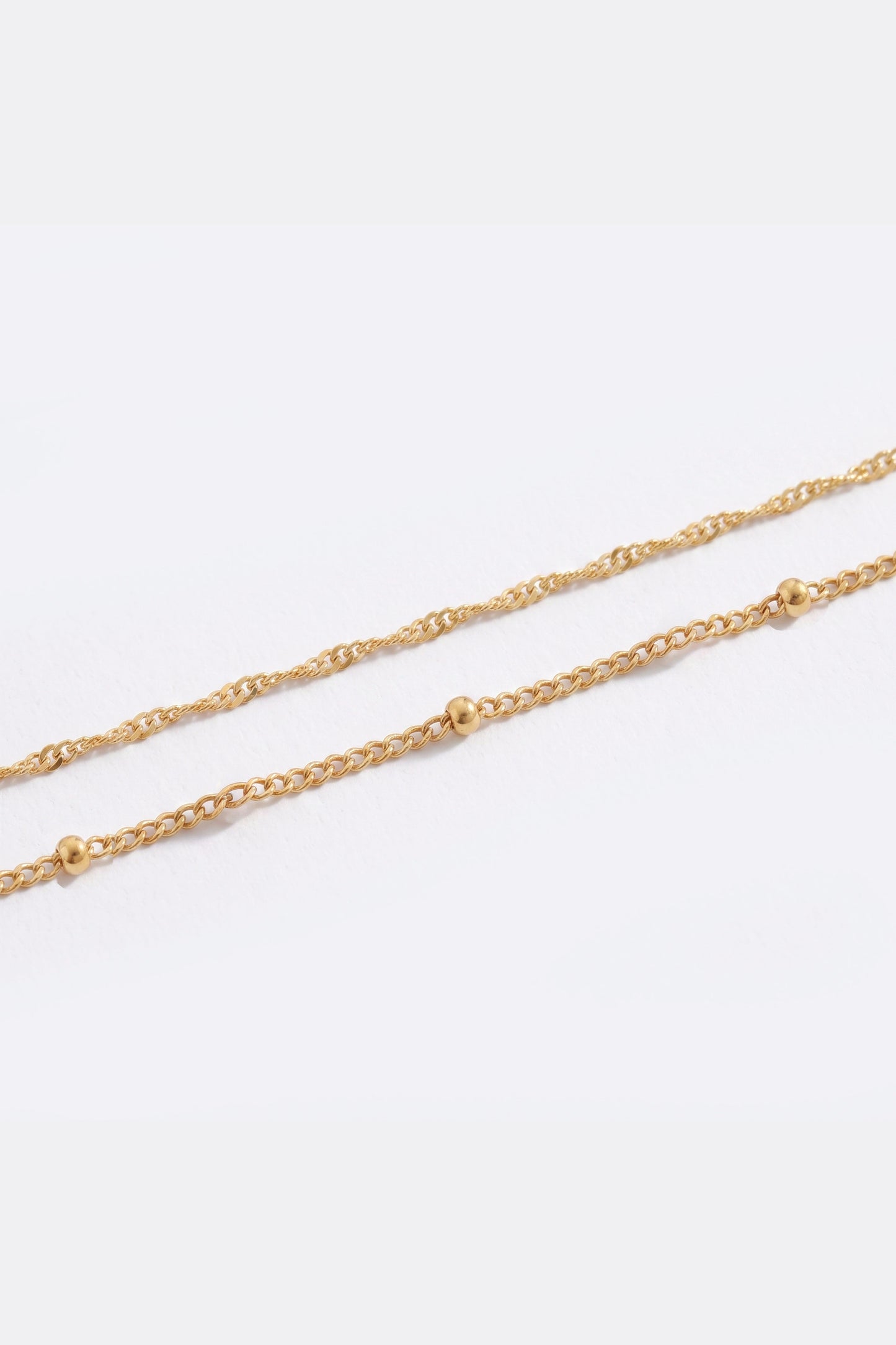 Singapore Twist and Satellite Chain Bracelet Bundle in gold tone, flat lay detail