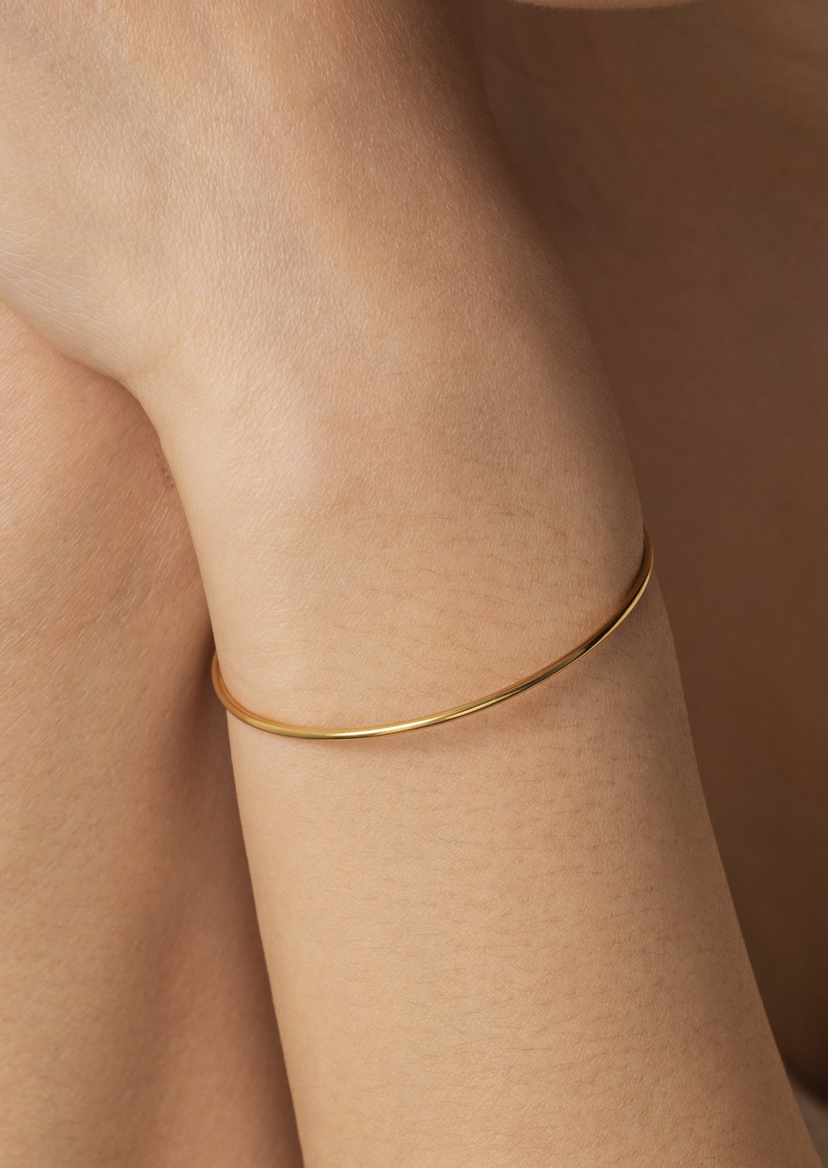 Solid Bar Cuff Bracelet, worn on a model