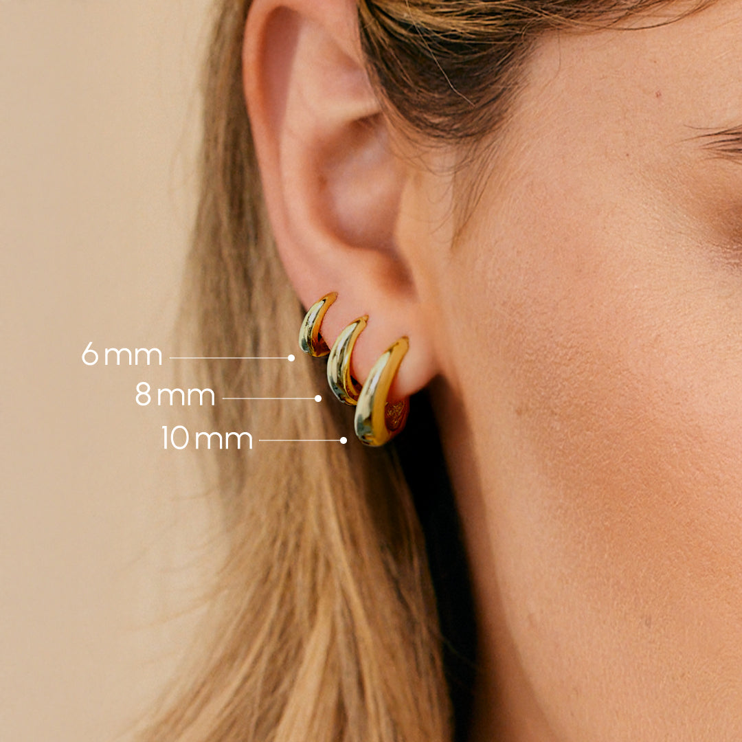 Teardrop Huggie Hoop Earrings, worn on a model