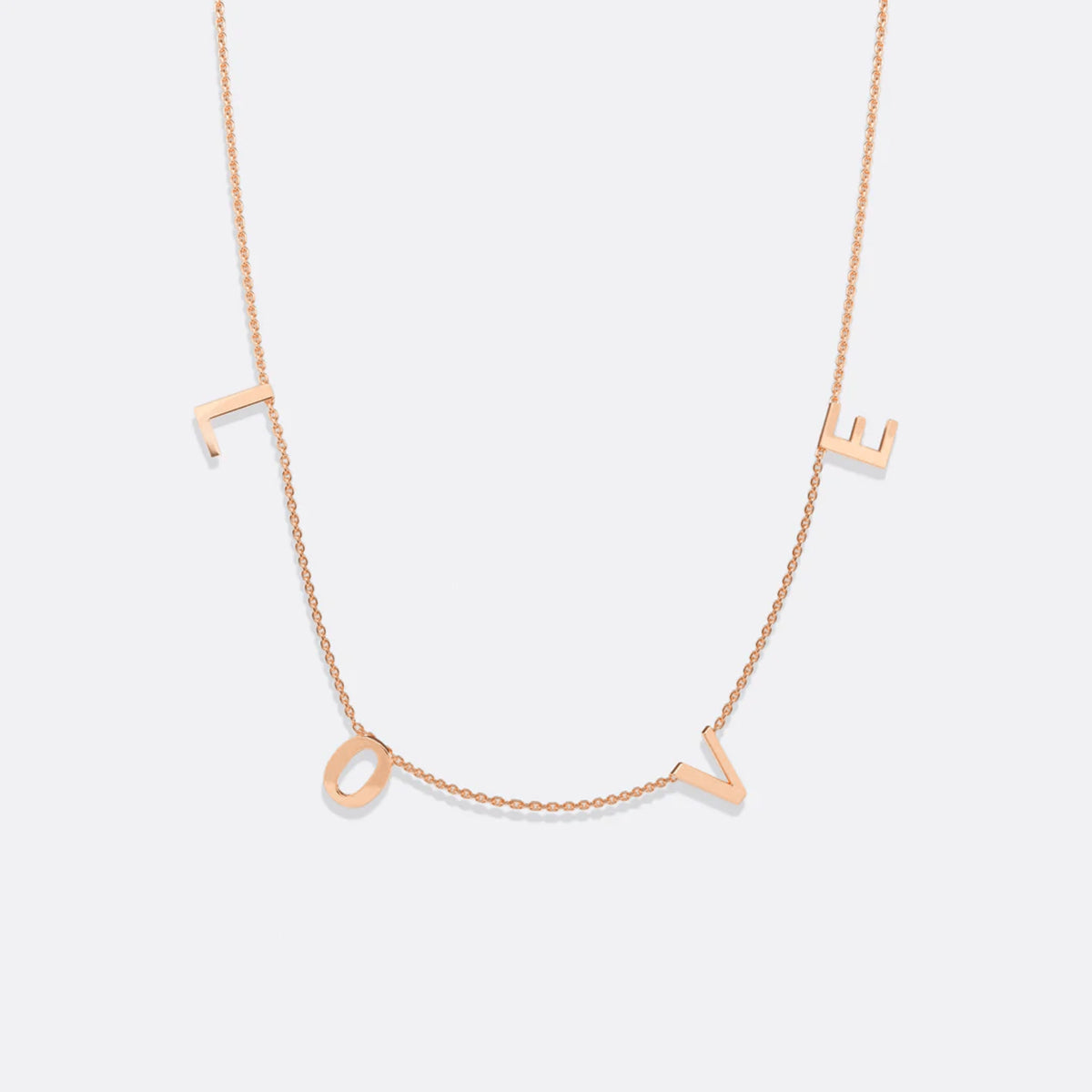 The LOVE Letter Necklace in rose gold tone