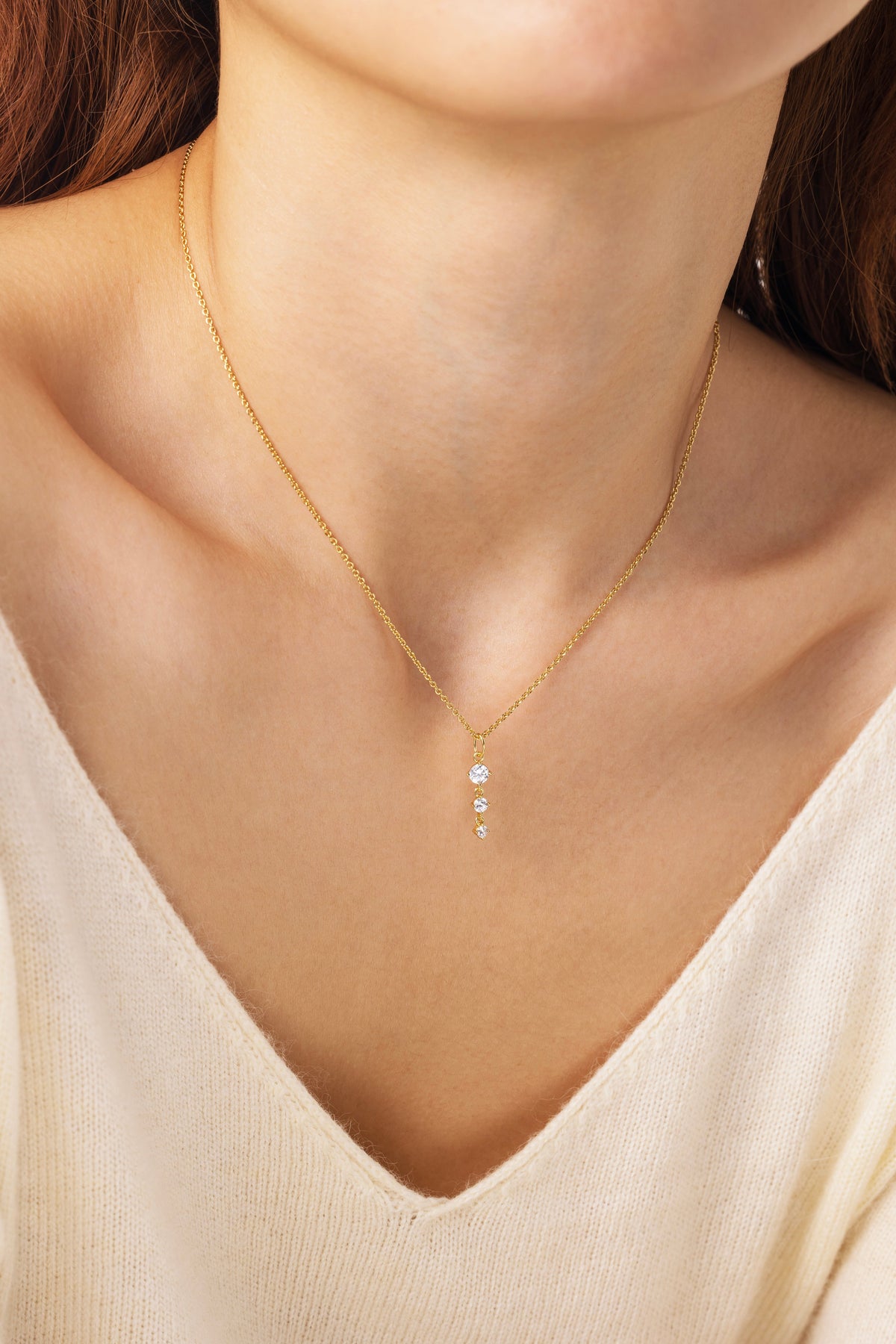 Three Stone Drop Pendant Necklace, worn on a model