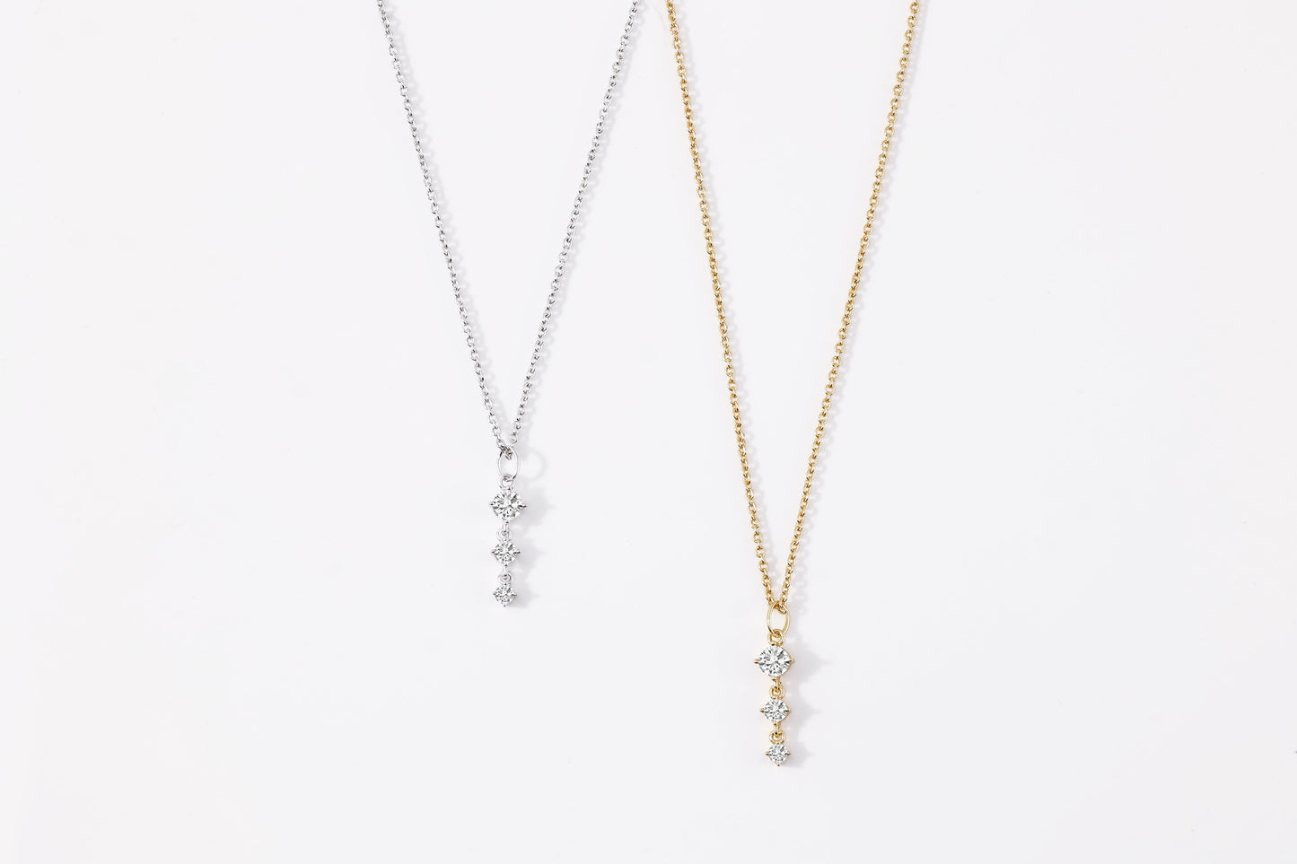 Three Stone Drop Pendant Necklace, flat lay detail