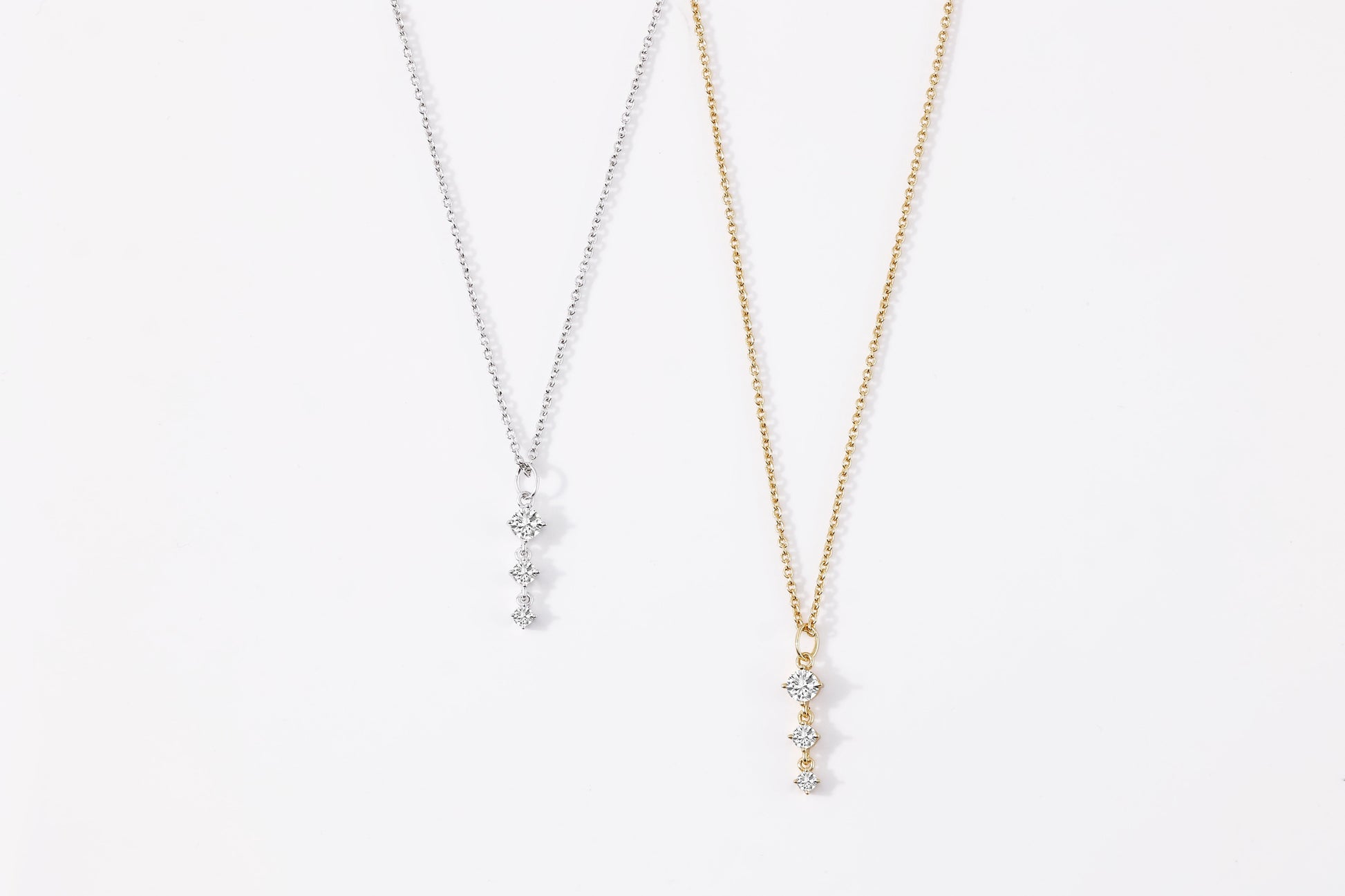 Three Stone Drop Pendant Necklace, flat lay detail
