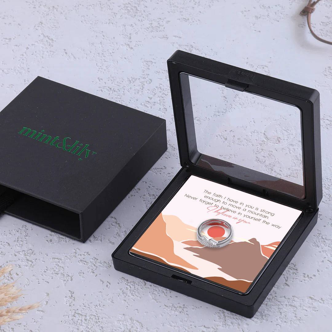 Faith Moves Mountains Pavé Mountain Ring, in its gift packaging