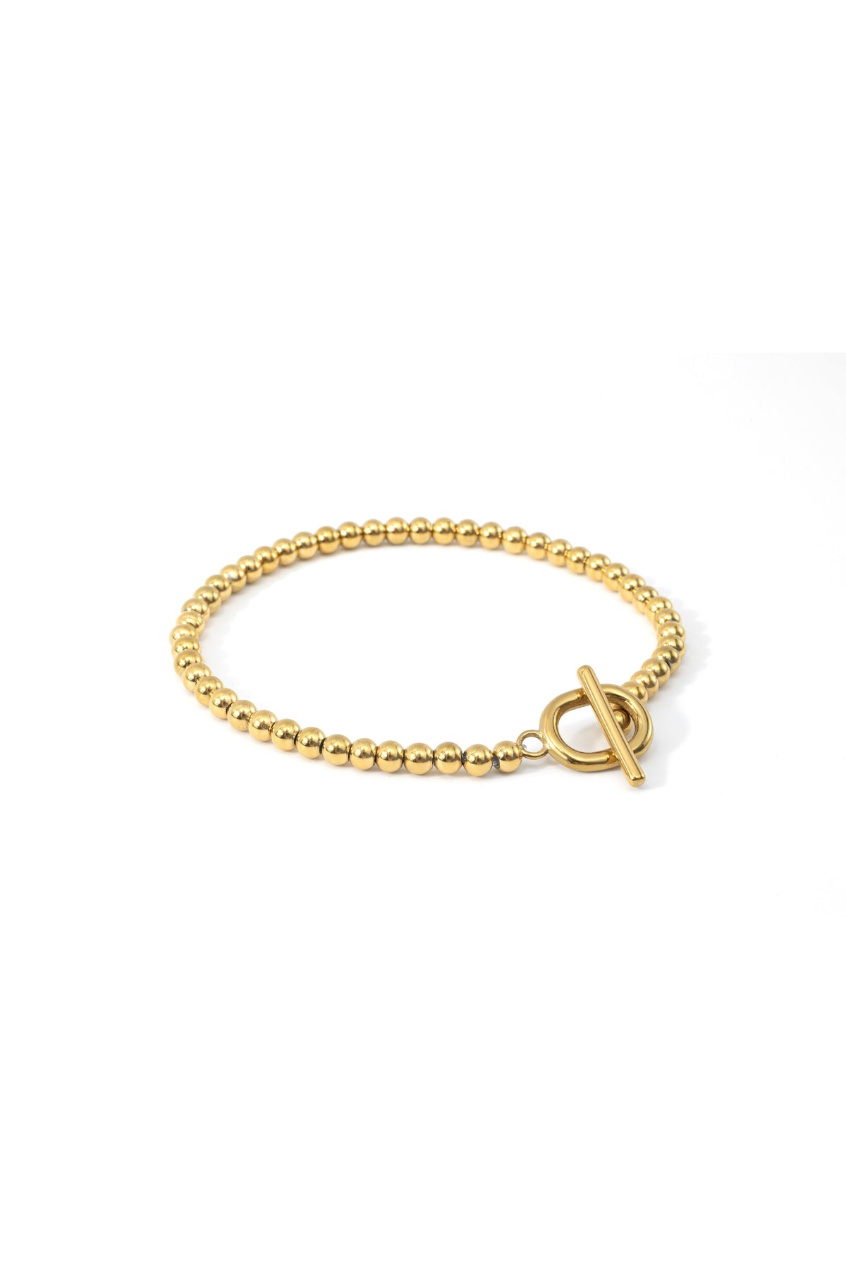 Toggle Clasp Beaded Bracelet in gold tone, flat lay detail