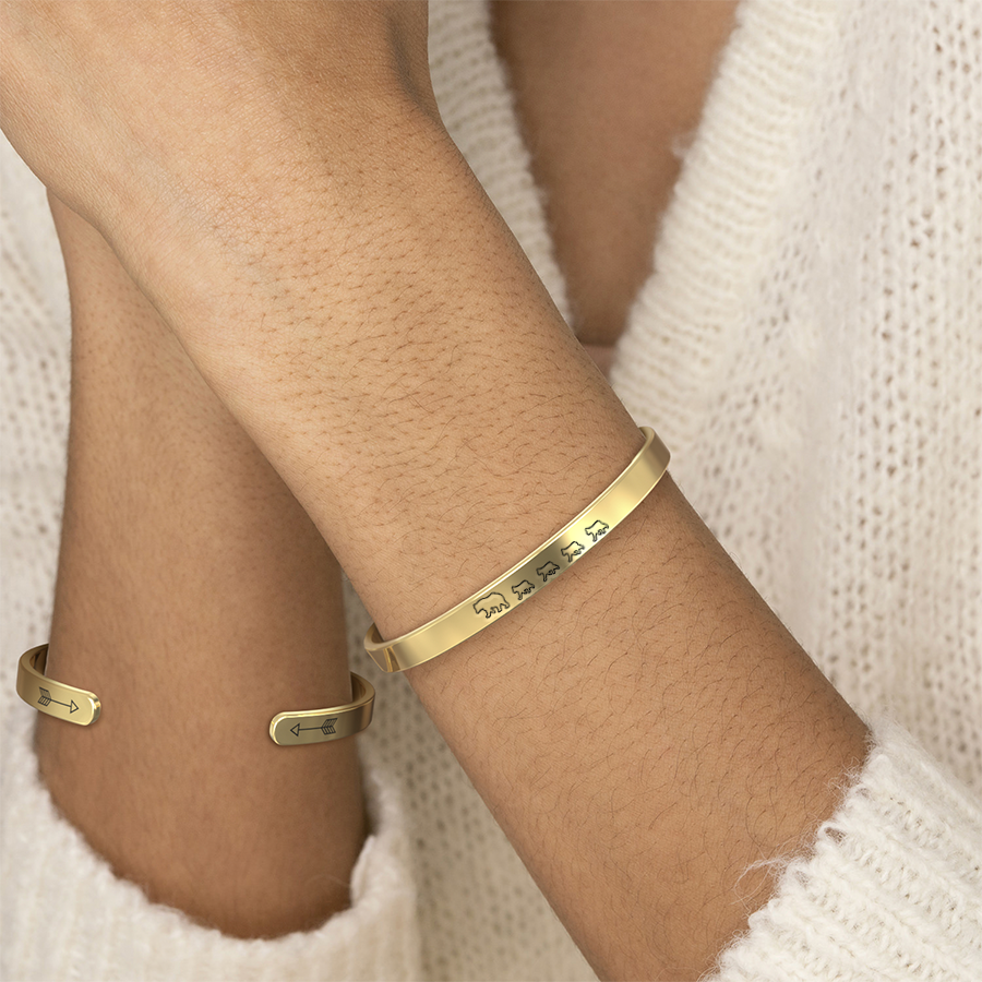 Mama Bear & Her Baby Bears Engraved Cuff Bracelet in gold tone, worn on a model