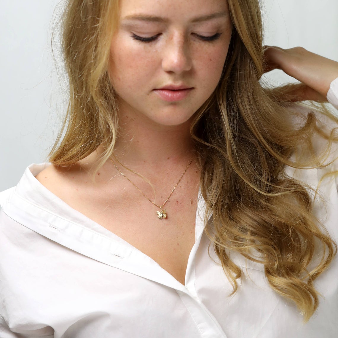 Collana con ciondolo a farfalla
