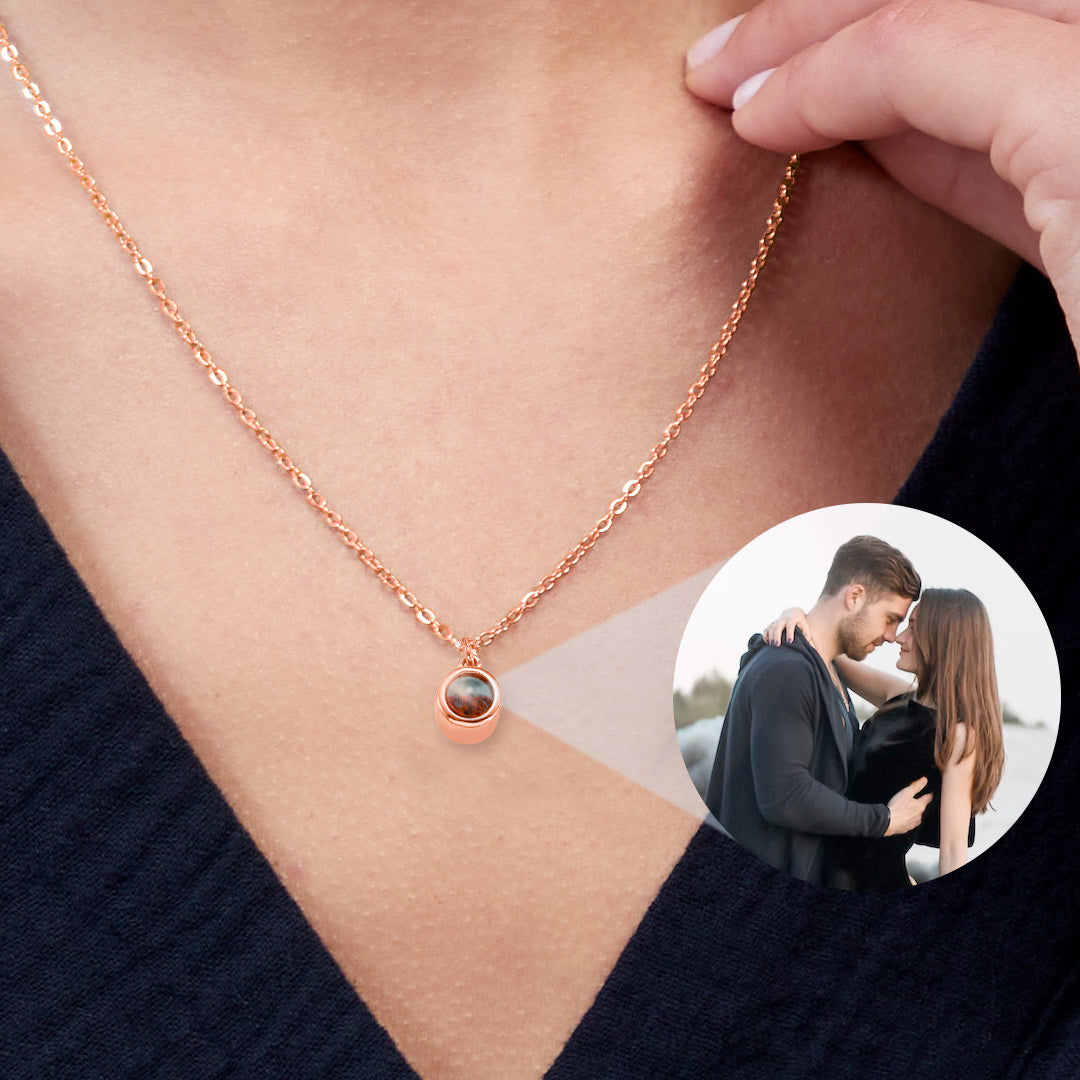 The Classic Photo Necklace in rose gold tone, worn on a model