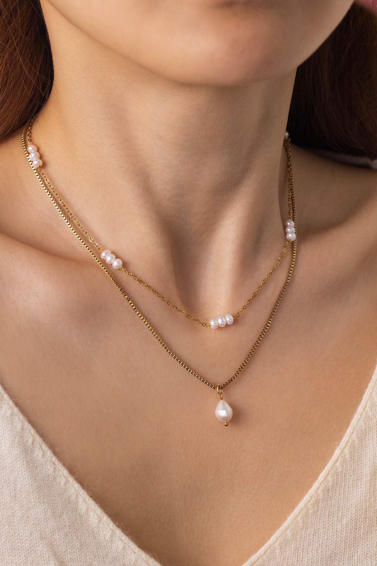 Dainty Layered Pearl Necklace, worn on a model