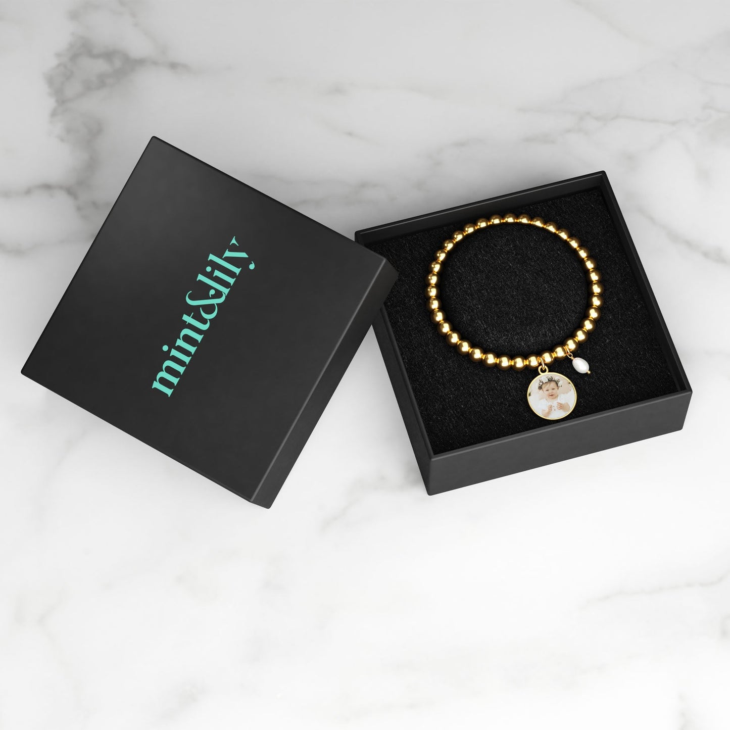 Personalized Photo Diana Charm Bracelet in gold tone, in its gift packaging
