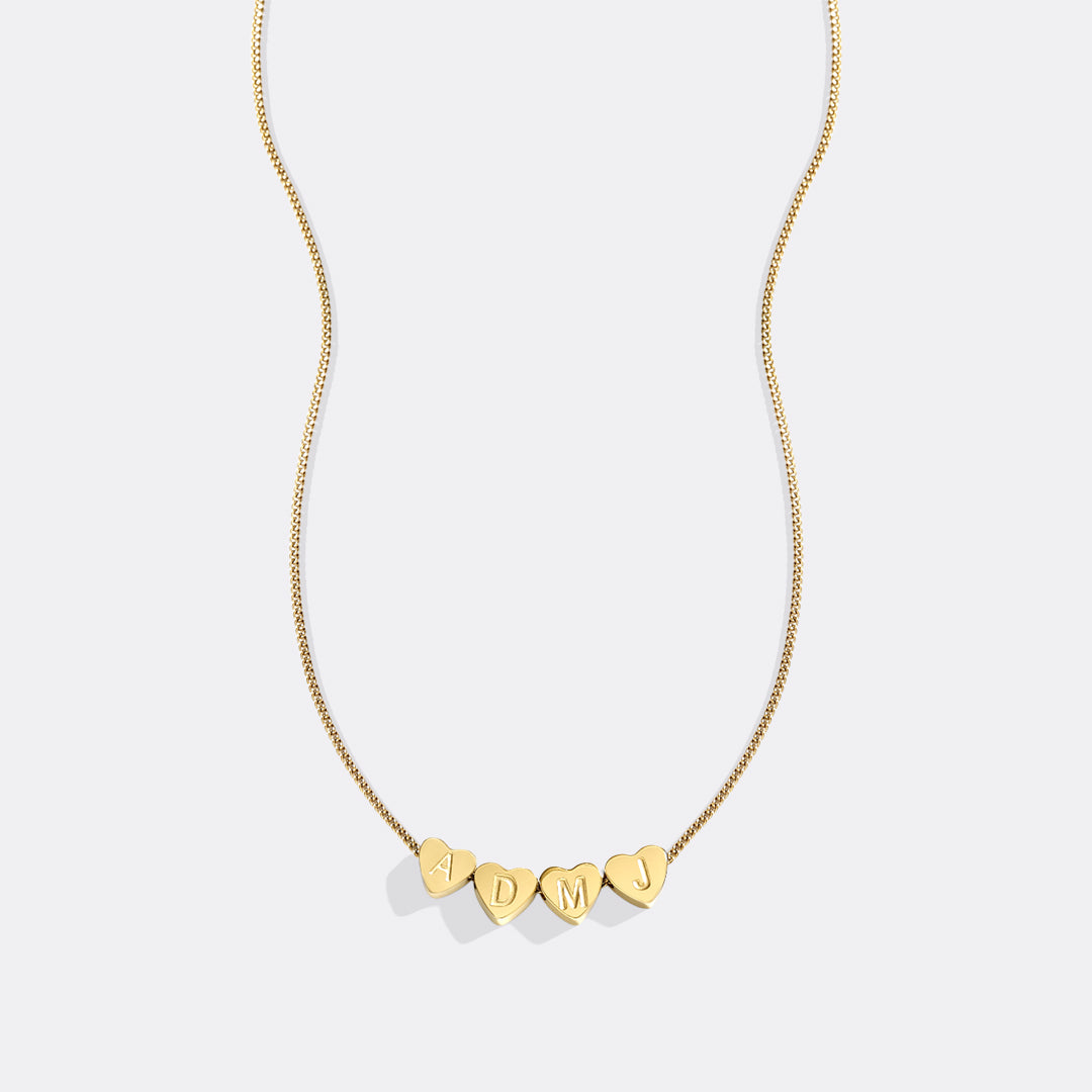 Collana iniziale a cuore impilabile delicata