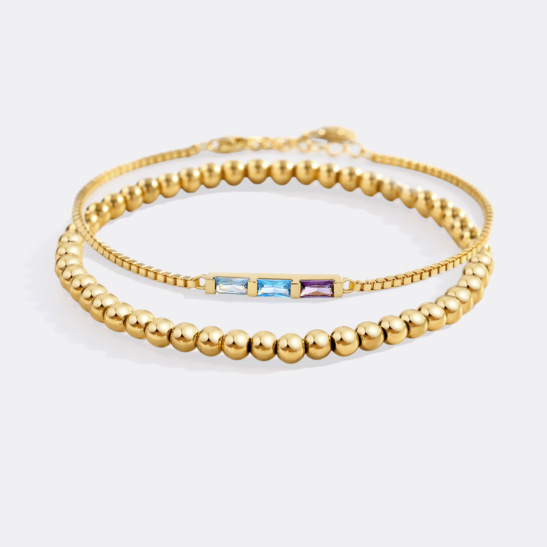 Zierliches Baguette-Geburtssteinarmband und Perlen-Stapelarmband-Set