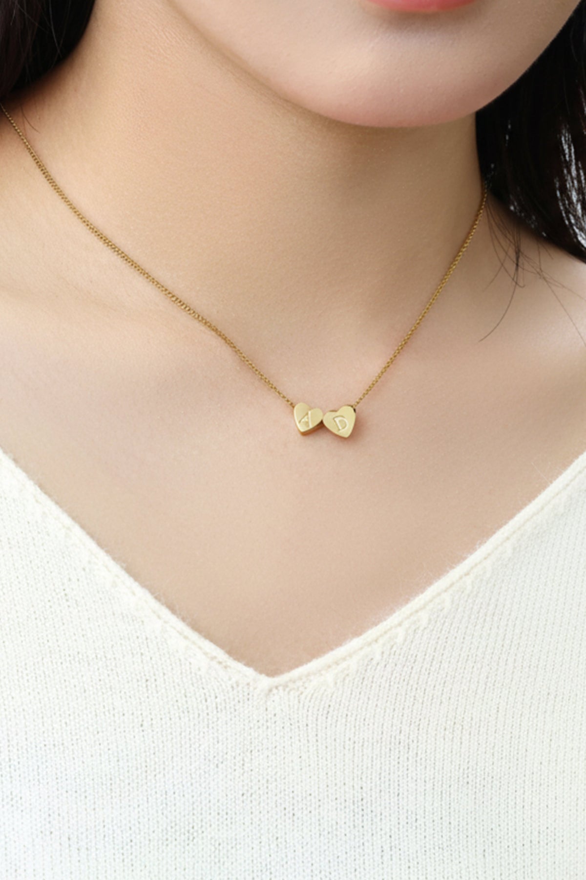 Collana iniziale a cuore impilabile delicata
