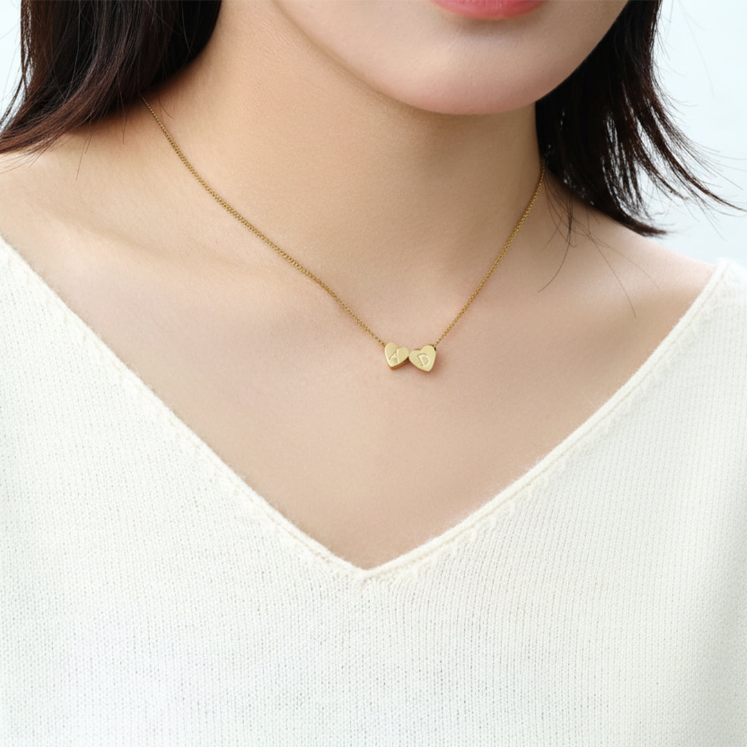 Collana iniziale a cuore impilabile delicata