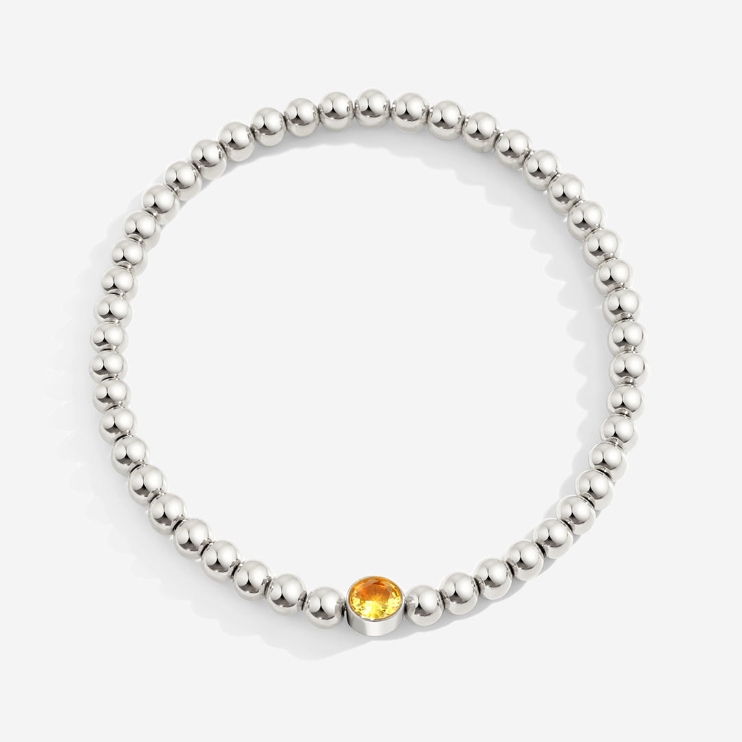 Vergoldetes Perlenarmband mit Geburtsstein