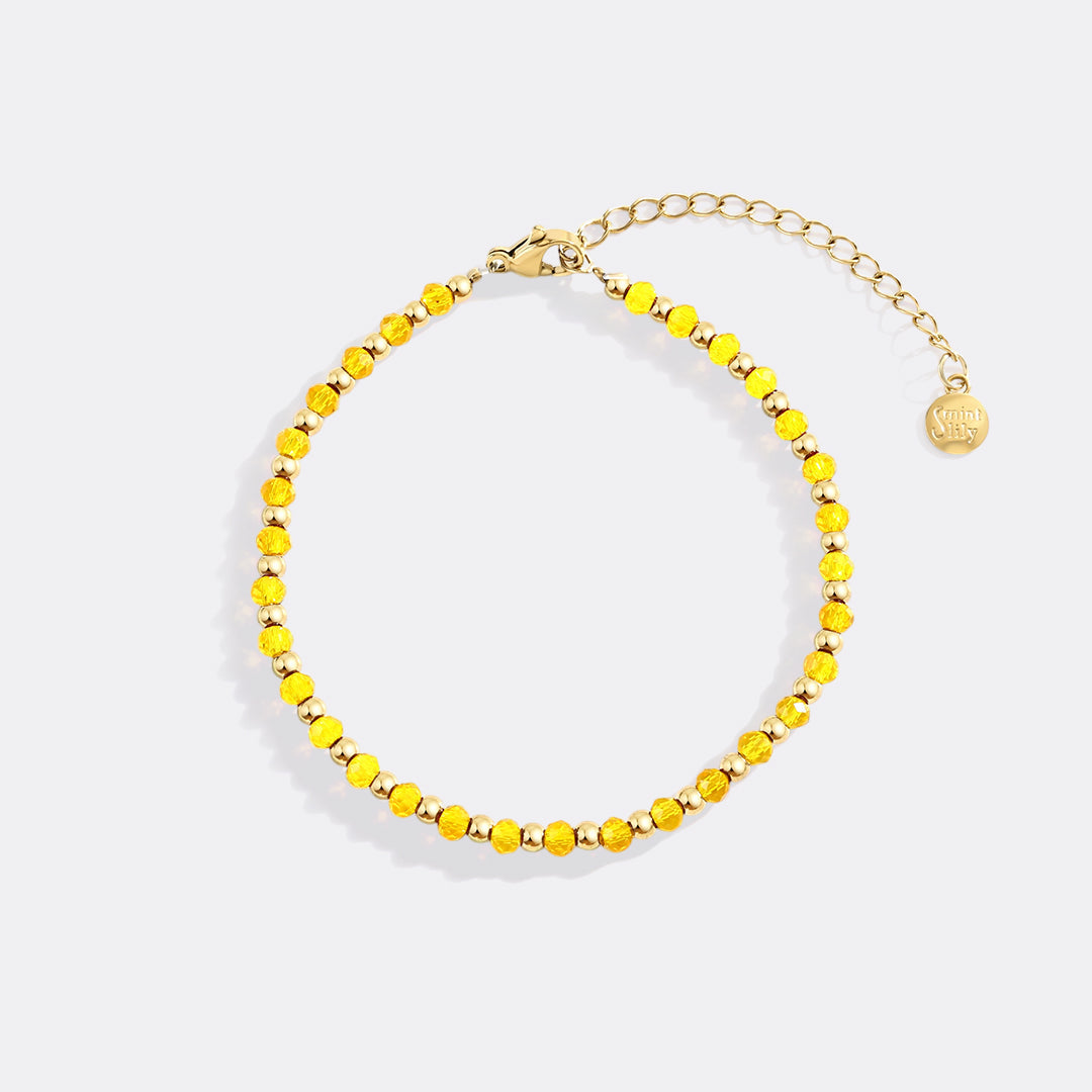 Geburtsstein- und Goldperlenarmband