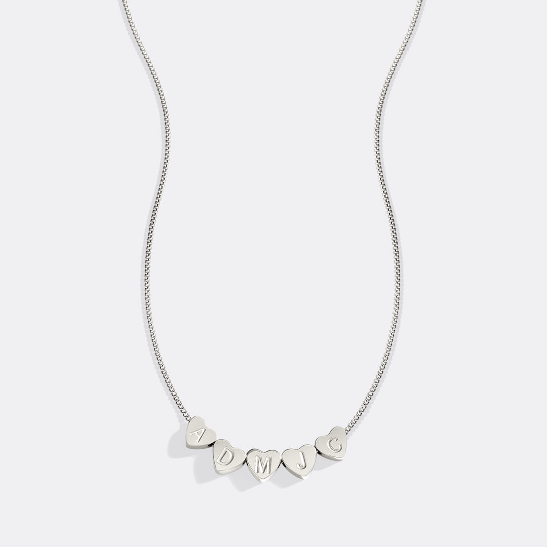 Collana iniziale a cuore impilabile delicata