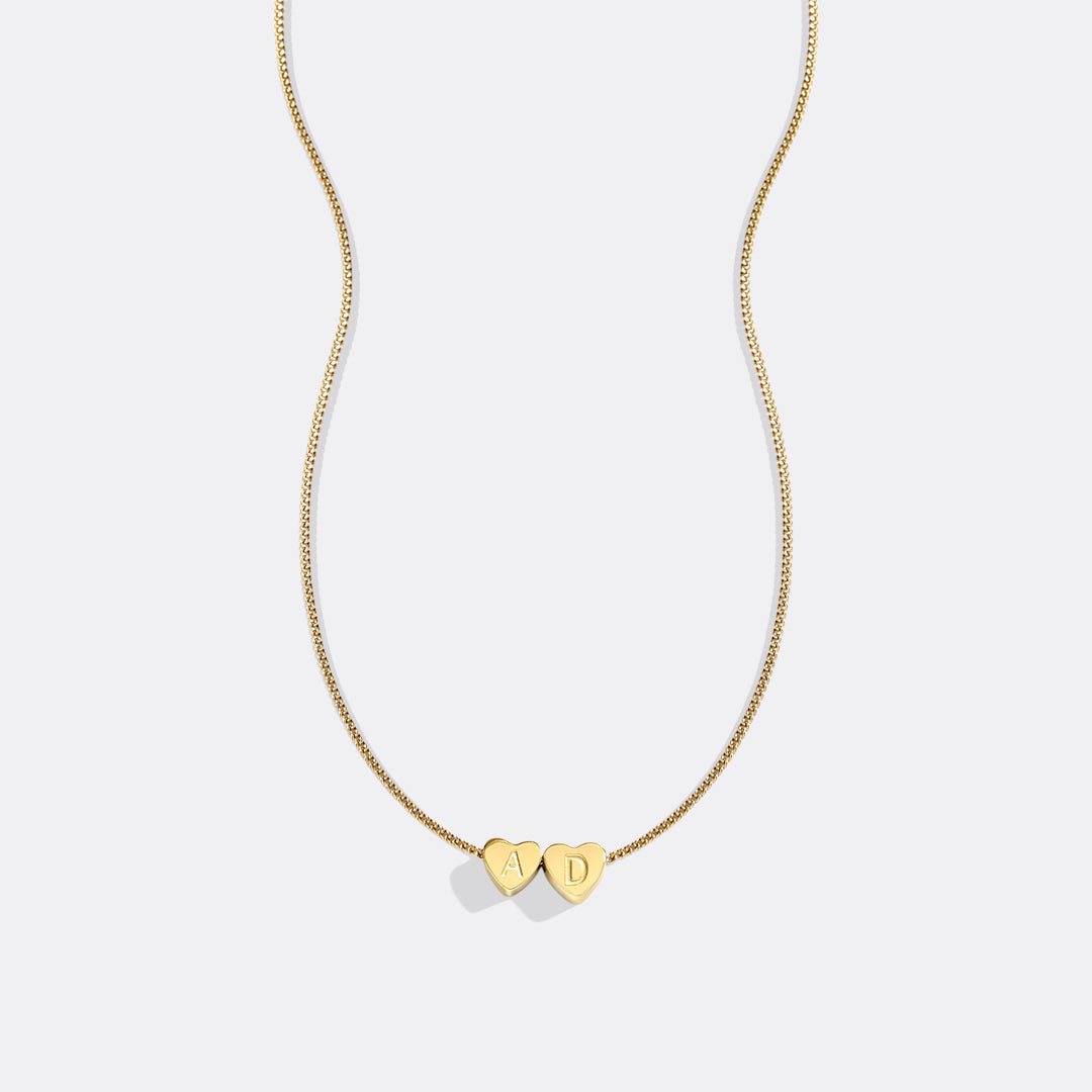 Collana iniziale a cuore impilabile delicata