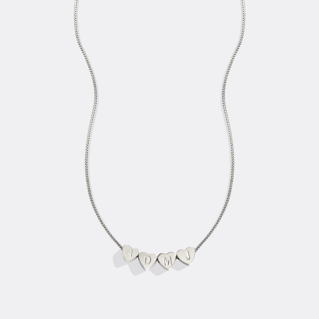 Collana iniziale a cuore impilabile delicata