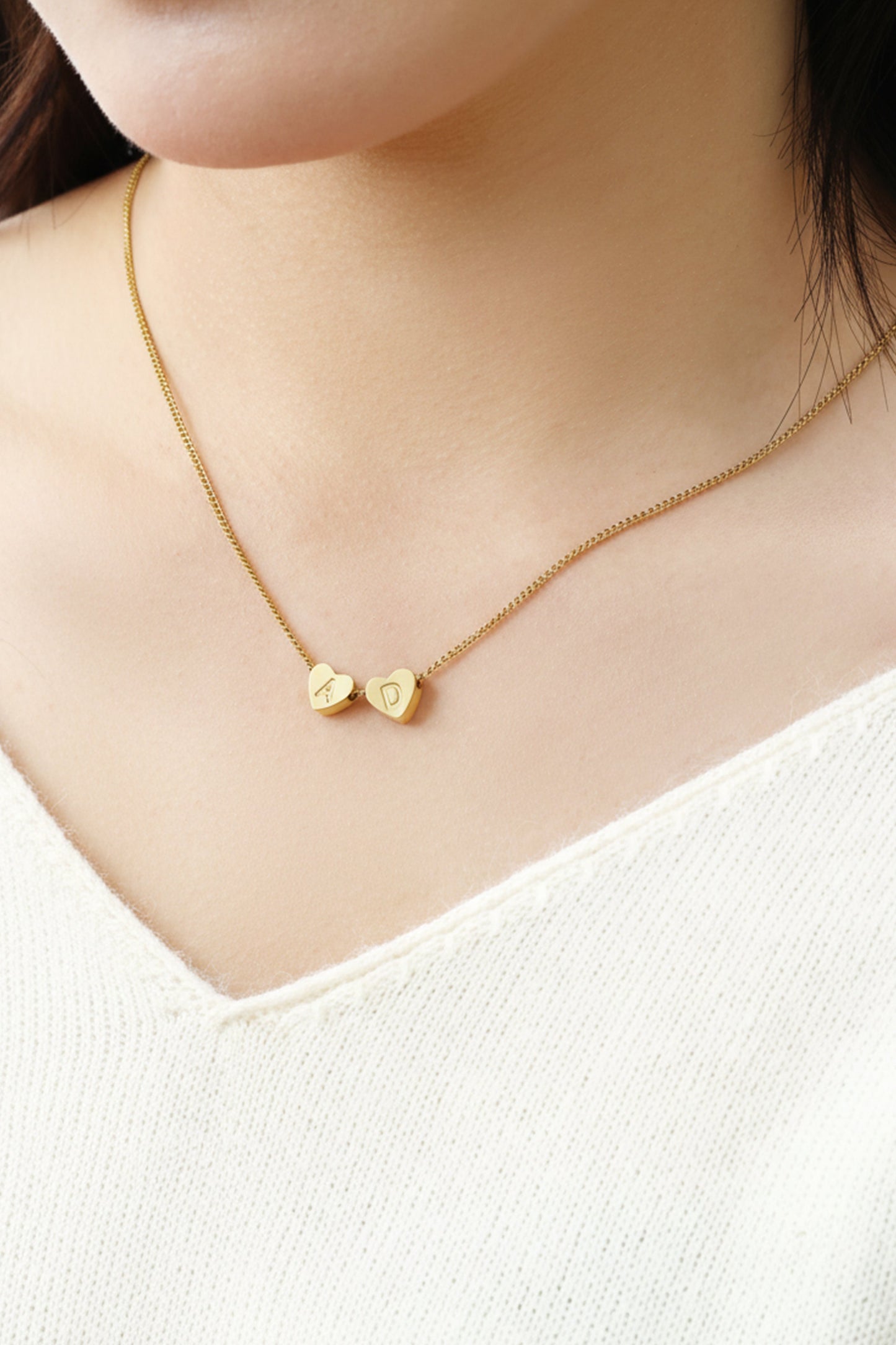 Collana iniziale a cuore impilabile delicata