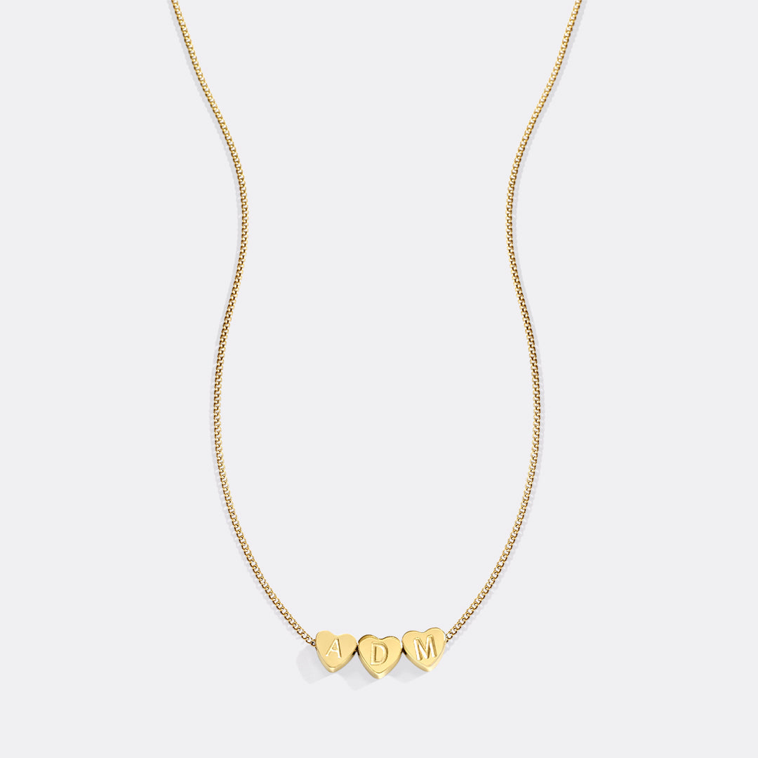 Collana iniziale a cuore impilabile delicata